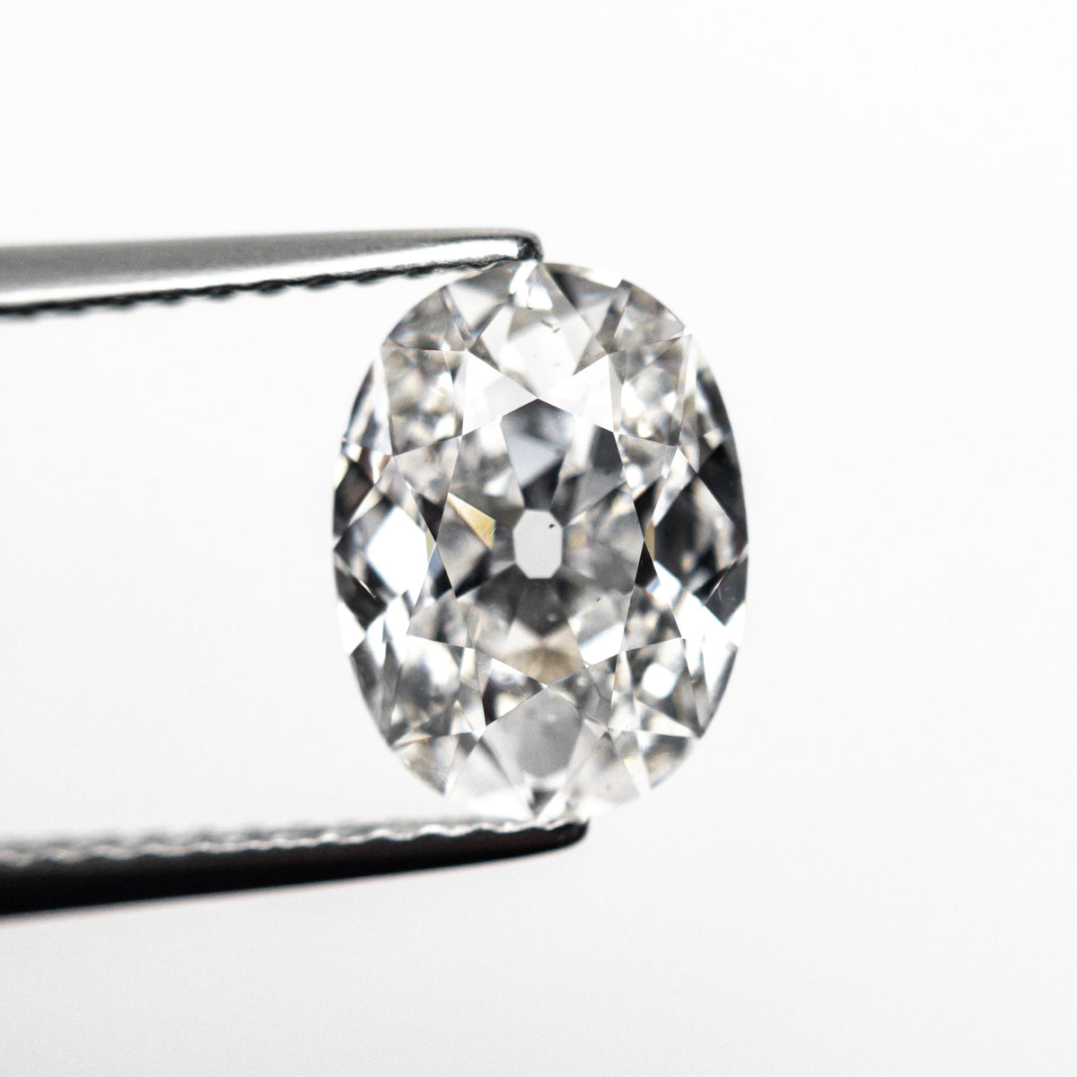 The 2.01ct 9.42x7.04x3.90mm GIA SI1 E Modern Antique Oval Brilliant 25159-01 by East London jeweller Rachel Boston | Discover our collections of unique and timeless engagement rings, wedding rings, and modern fine jewellery.