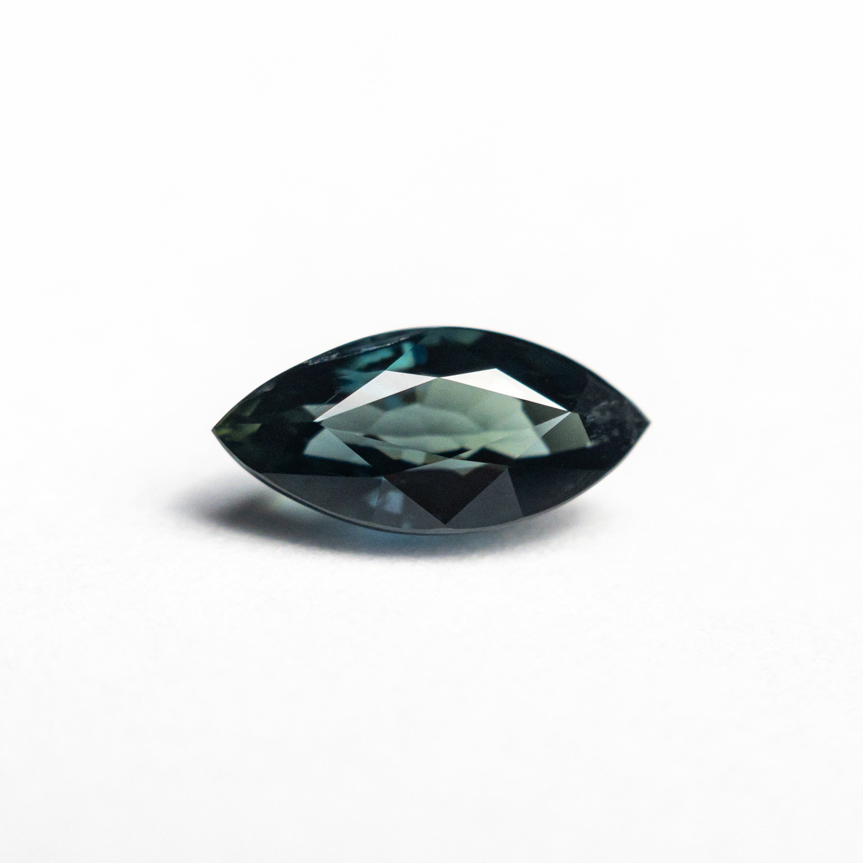 The 1.16ct 8.57x4.24x3.67mm Marquise Brilliant Sapphire 25364-03 by East London jeweller Rachel Boston | Discover our collections of unique and timeless engagement rings, wedding rings, and modern fine jewellery.