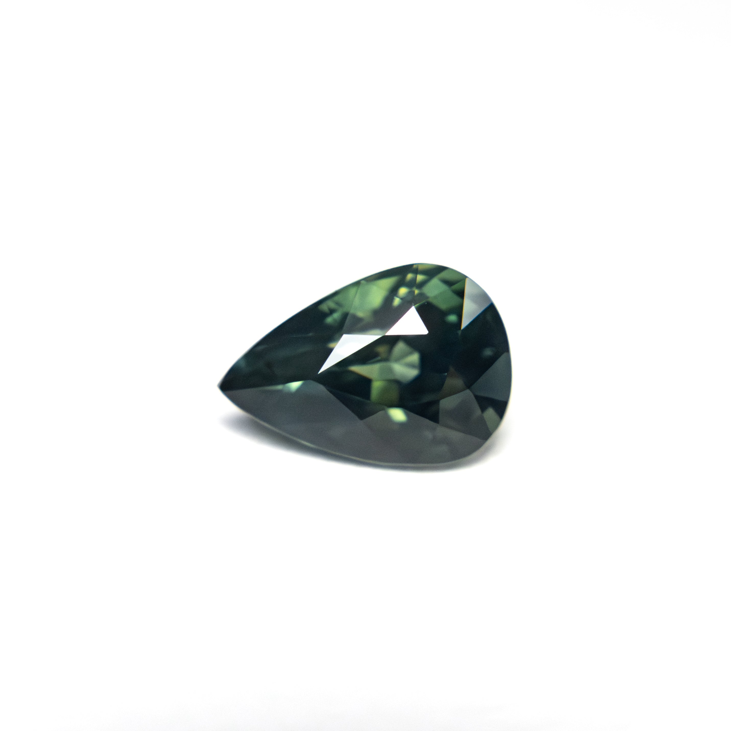The 1.00ct 7.10x4.56x4.06mm Pear Brilliant Sapphire 25366-01 by East London jeweller Rachel Boston | Discover our collections of unique and timeless engagement rings, wedding rings, and modern fine jewellery.