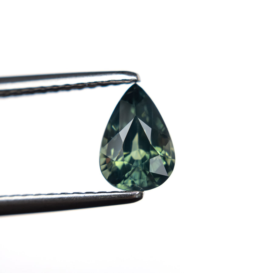 The 1.00ct 7.10x4.56x4.06mm Pear Brilliant Sapphire 25366-01 by East London jeweller Rachel Boston | Discover our collections of unique and timeless engagement rings, wedding rings, and modern fine jewellery. - Rachel Boston Jewellery