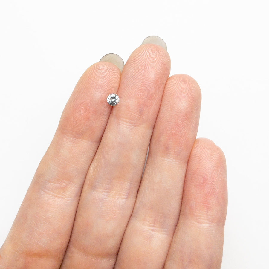 The 0.19ct 3.56x3.55x2.17mm Round Brilliant Sapphire 25440-01 by East London jeweller Rachel Boston | Discover our collections of unique and timeless engagement rings, wedding rings, and modern fine jewellery. - Rachel Boston Jewellery