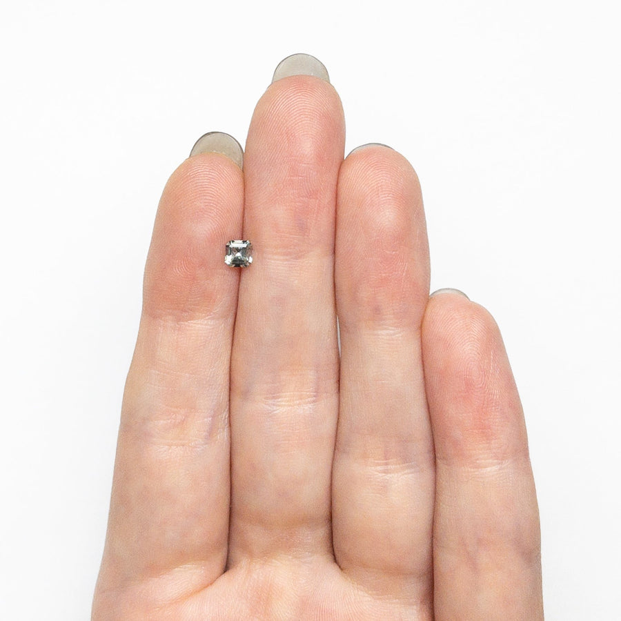 The 0.31ct 3.80x3.78x2.41mm Cut Corner Rectangle Step Cut Sapphire 25447-01 by East London jeweller Rachel Boston | Discover our collections of unique and timeless engagement rings, wedding rings, and modern fine jewellery. - Rachel Boston Jewellery