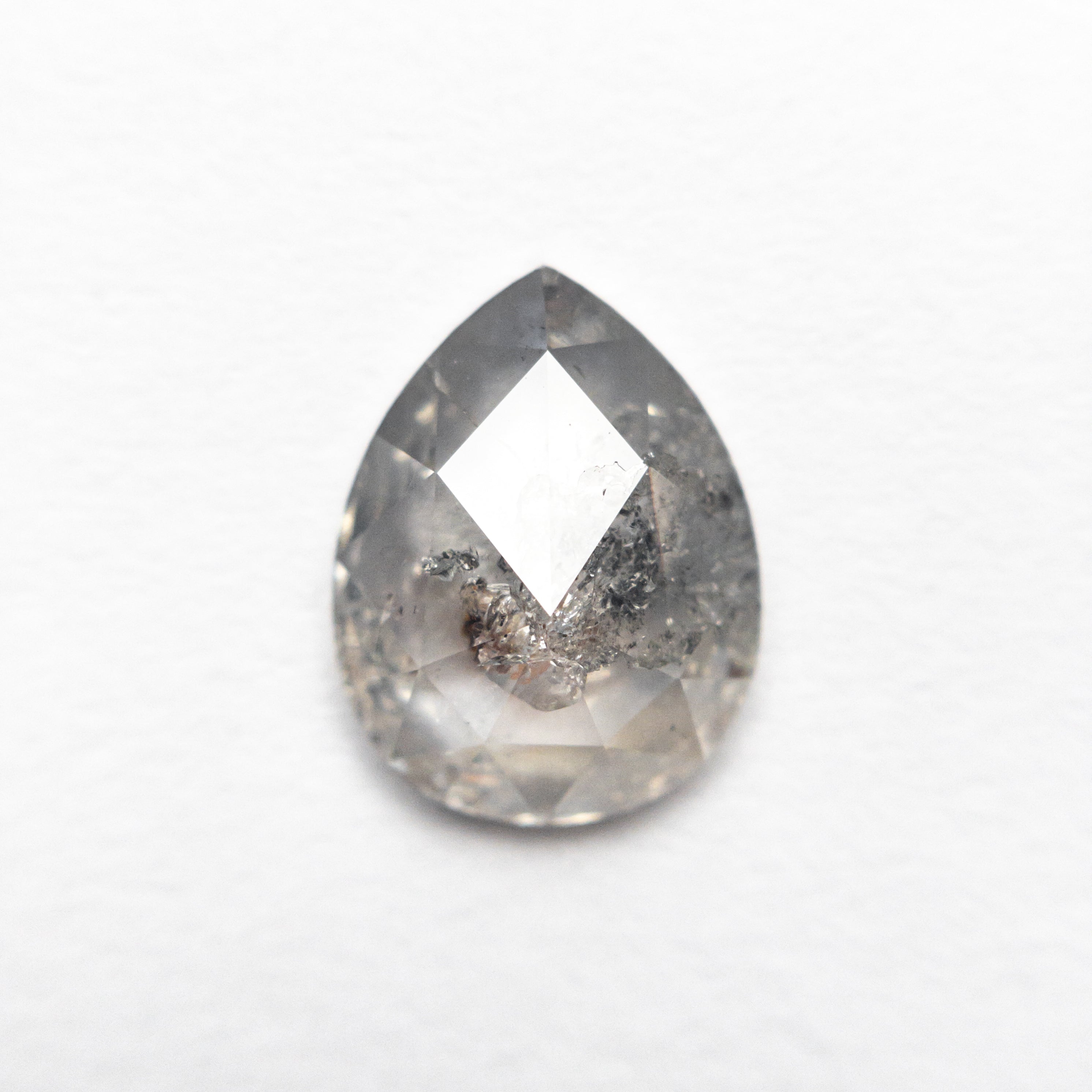 The 1.62ct 9.61x7.38x3.04mm Pear Rosecut 25450-07 by East London jeweller Rachel Boston | Discover our collections of unique and timeless engagement rings, wedding rings, and modern fine jewellery.