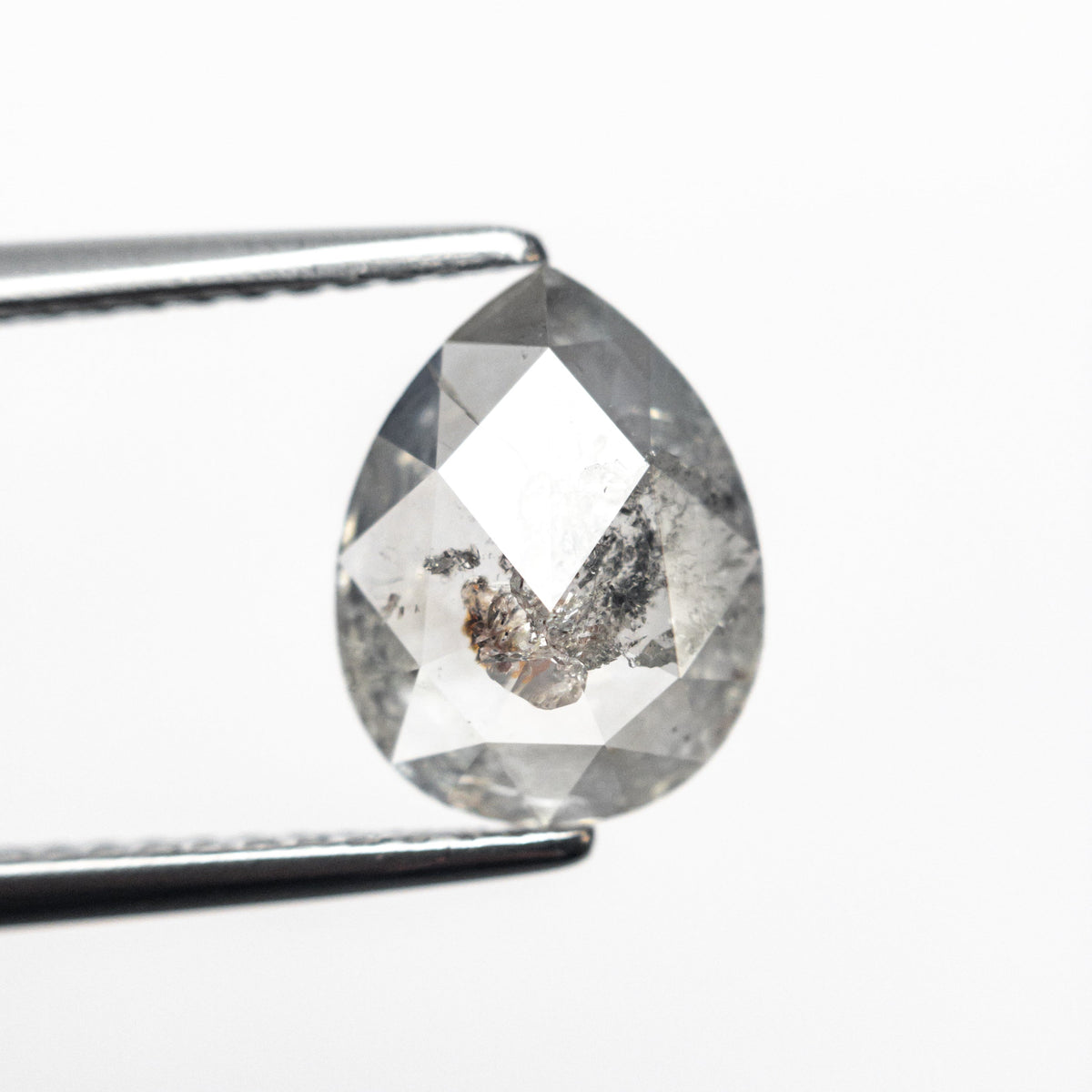 The 1.62ct 9.61x7.38x3.04mm Pear Rosecut 25450-07 by East London jeweller Rachel Boston | Discover our collections of unique and timeless engagement rings, wedding rings, and modern fine jewellery.