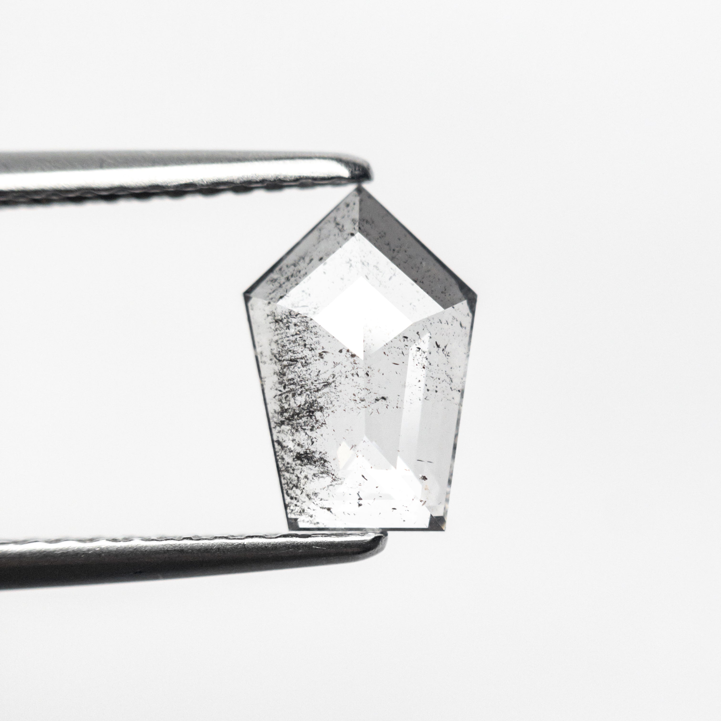 The 0.92ct 9.12x6.19x1.81mm Shield Rosecut 25450-10 by East London jeweller Rachel Boston | Discover our collections of unique and timeless engagement rings, wedding rings, and modern fine jewellery.