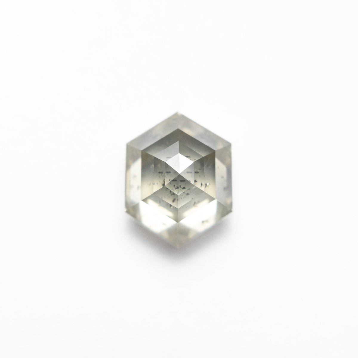 The 1.66ct 7.65x6.06x4.36mm Hexagon Step Cut 25455-04 by East London jeweller Rachel Boston | Discover our collections of unique and timeless engagement rings, wedding rings, and modern fine jewellery.