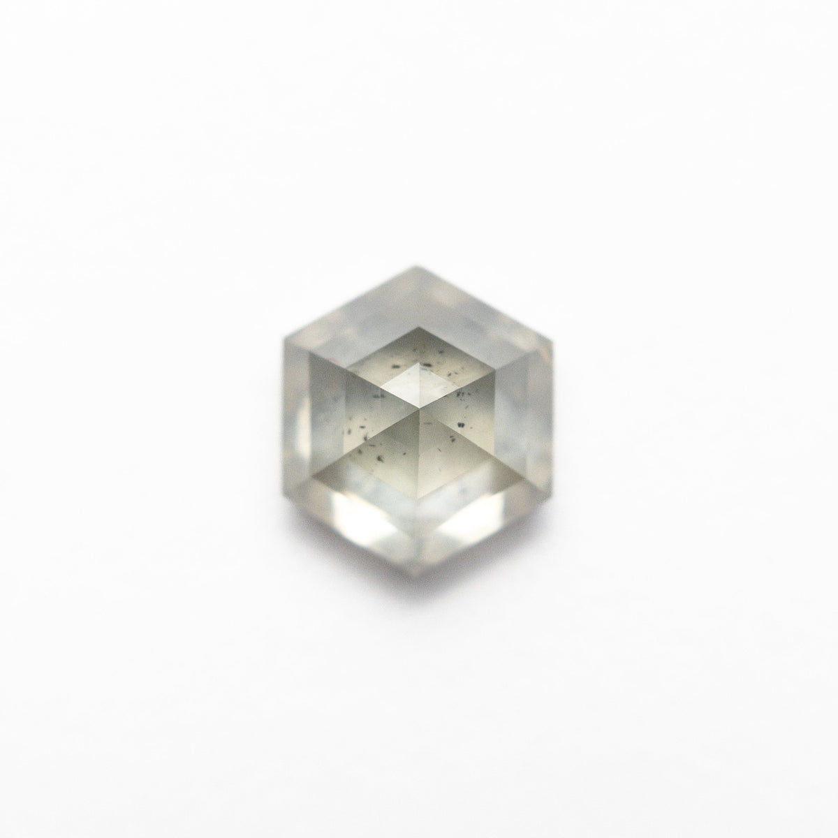 The 1.59ct 7.54x6.54x4.31mm Hexagon Step Cut 25455-10 by East London jeweller Rachel Boston | Discover our collections of unique and timeless engagement rings, wedding rings, and modern fine jewellery.