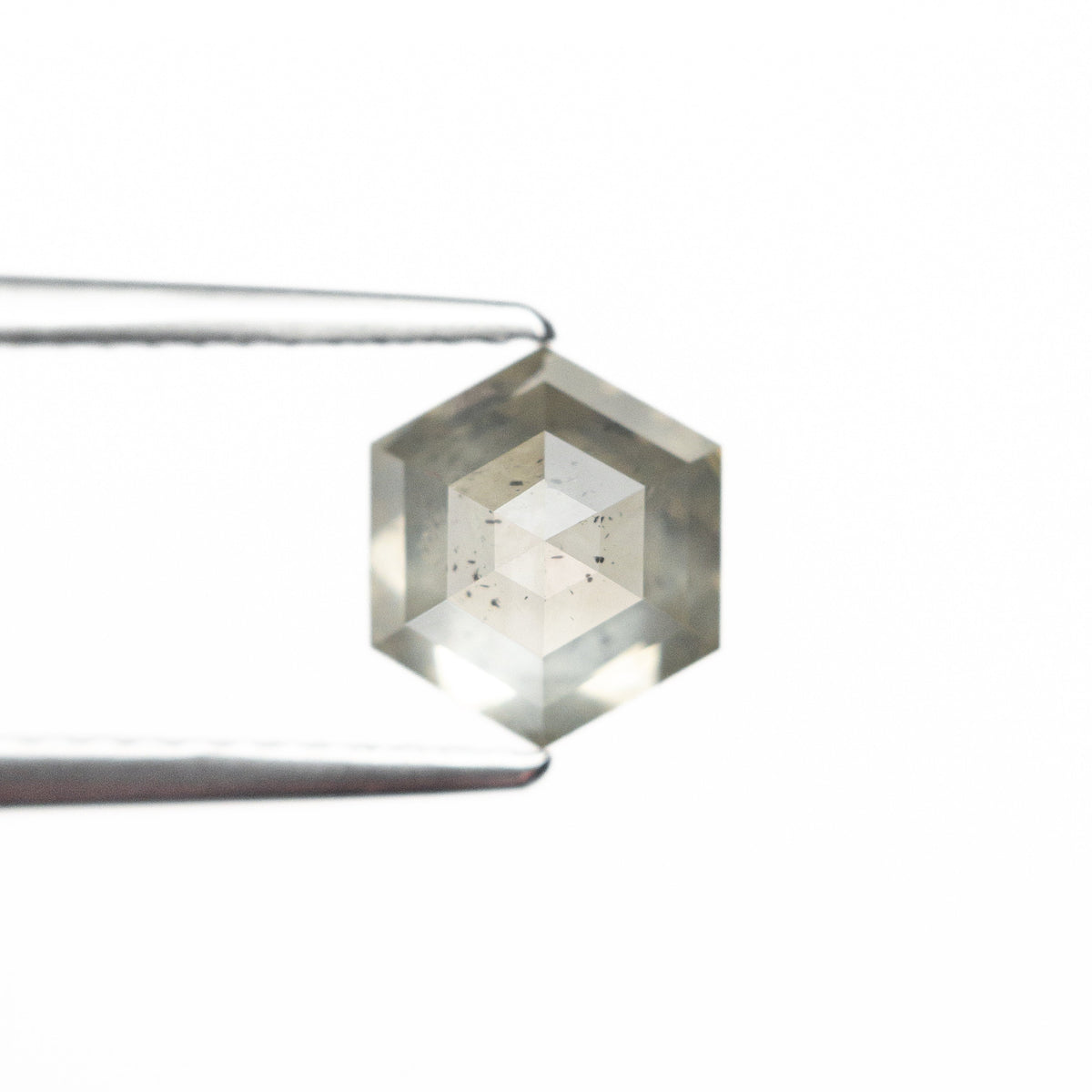 The 1.59ct 7.54x6.54x4.31mm Hexagon Step Cut 25455-10 by East London jeweller Rachel Boston | Discover our collections of unique and timeless engagement rings, wedding rings, and modern fine jewellery.