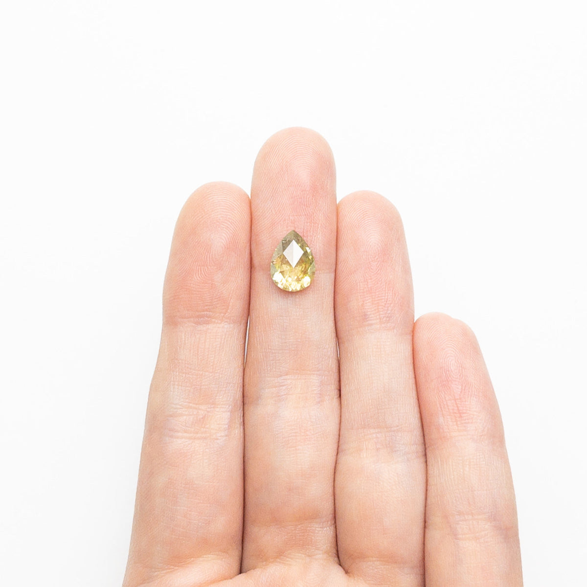 The 2.31ct 9.76x7.19x4.19mm Pear Double Cut 25455-12 by East London jeweller Rachel Boston | Discover our collections of unique and timeless engagement rings, wedding rings, and modern fine jewellery.