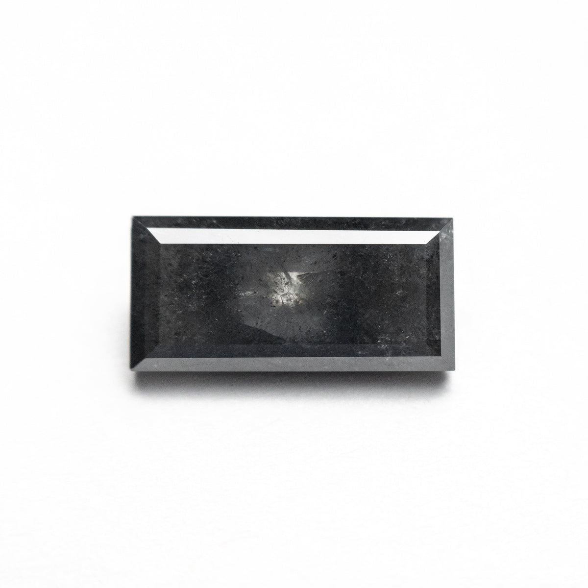 The 1.90ct 10.45x5.00x3.06mm Rectangle Step Cut 25456-17 by East London jeweller Rachel Boston | Discover our collections of unique and timeless engagement rings, wedding rings, and modern fine jewellery.