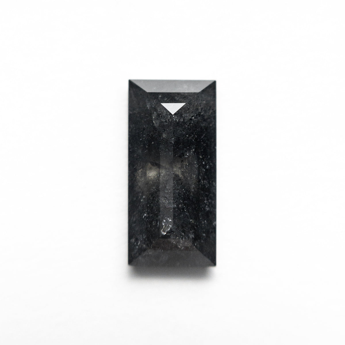 The 1.90ct 10.45x5.00x3.06mm Rectangle Step Cut 25456-17 by East London jeweller Rachel Boston | Discover our collections of unique and timeless engagement rings, wedding rings, and modern fine jewellery.