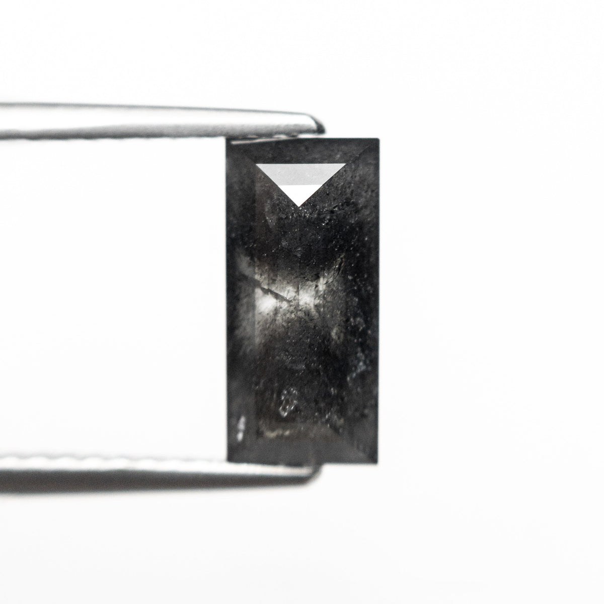 The 1.90ct 10.45x5.00x3.06mm Rectangle Step Cut 25456-17 by East London jeweller Rachel Boston | Discover our collections of unique and timeless engagement rings, wedding rings, and modern fine jewellery.