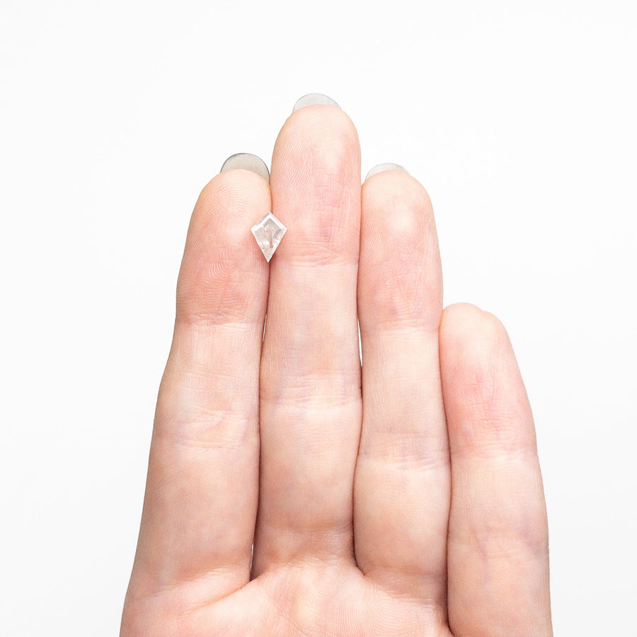 The 0.75ct 7.79x5.40x3.29mm Kite Step Cut 25457-10 by East London jeweller Rachel Boston | Discover our collections of unique and timeless engagement rings, wedding rings, and modern fine jewellery. - Rachel Boston Jewellery