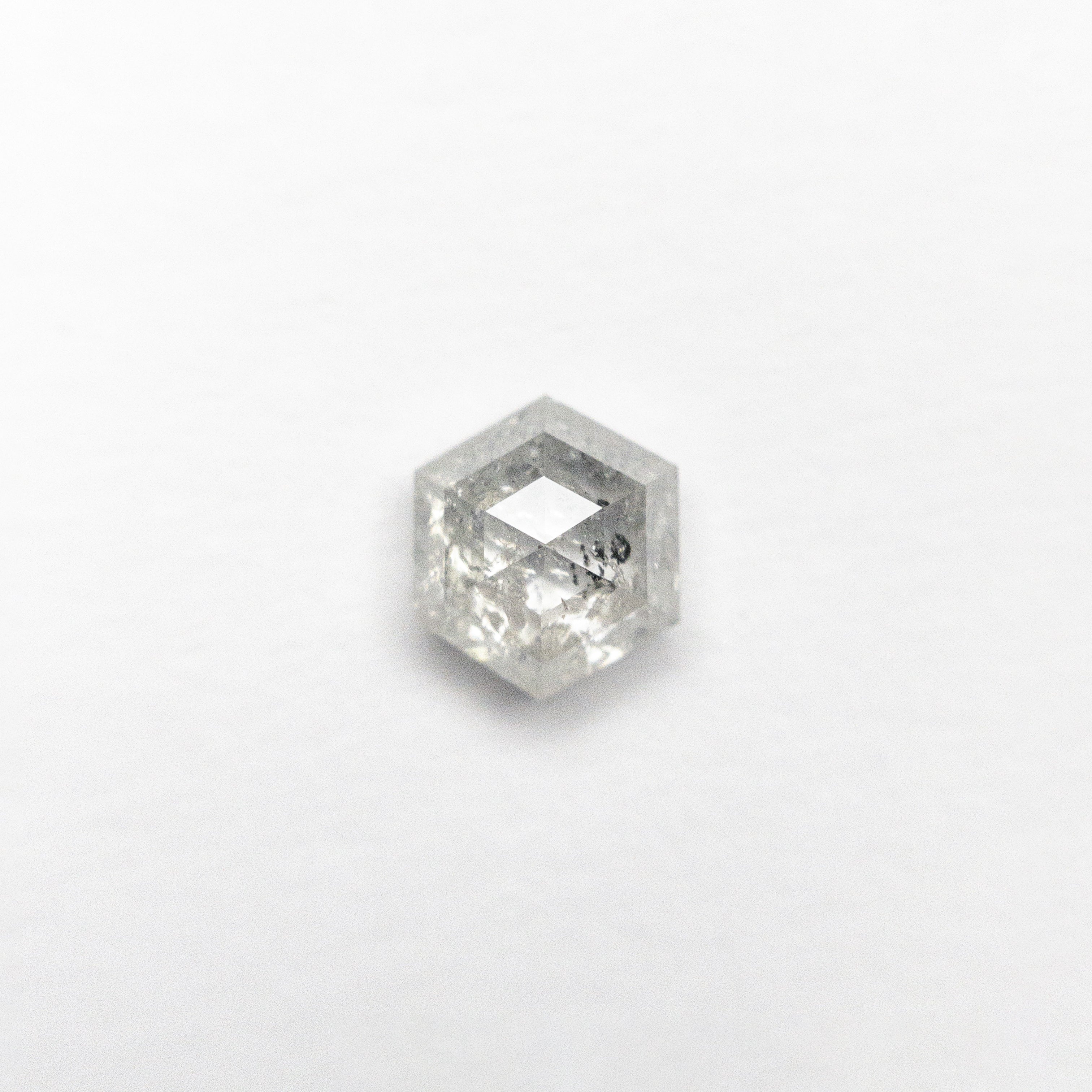 The 0.72ct 5.59x4.86x3.17mm Hexagon Step Cut 25457-15 by East London jeweller Rachel Boston | Discover our collections of unique and timeless engagement rings, wedding rings, and modern fine jewellery.