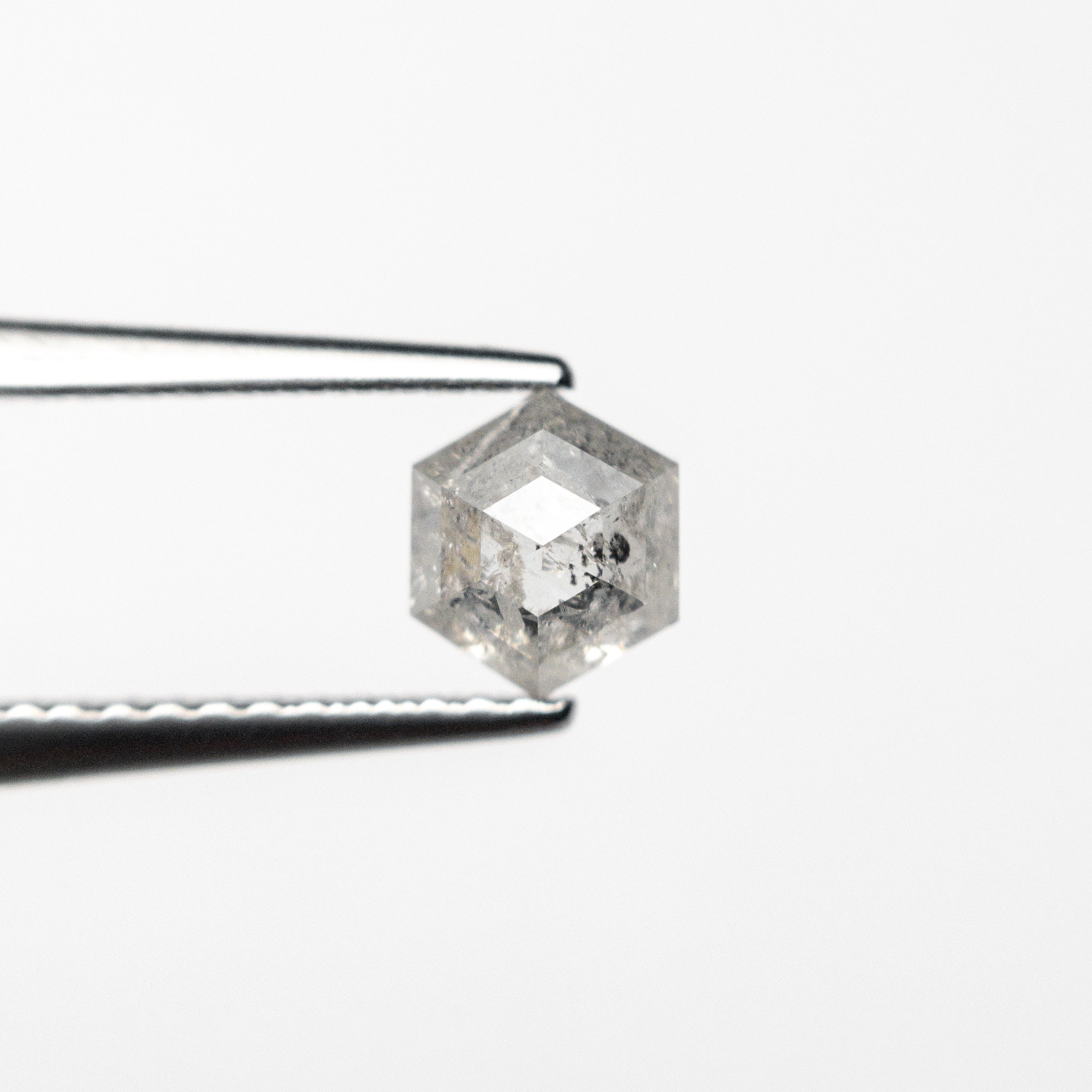 The 0.72ct 5.59x4.86x3.17mm Hexagon Step Cut 25457-15 by East London jeweller Rachel Boston | Discover our collections of unique and timeless engagement rings, wedding rings, and modern fine jewellery.