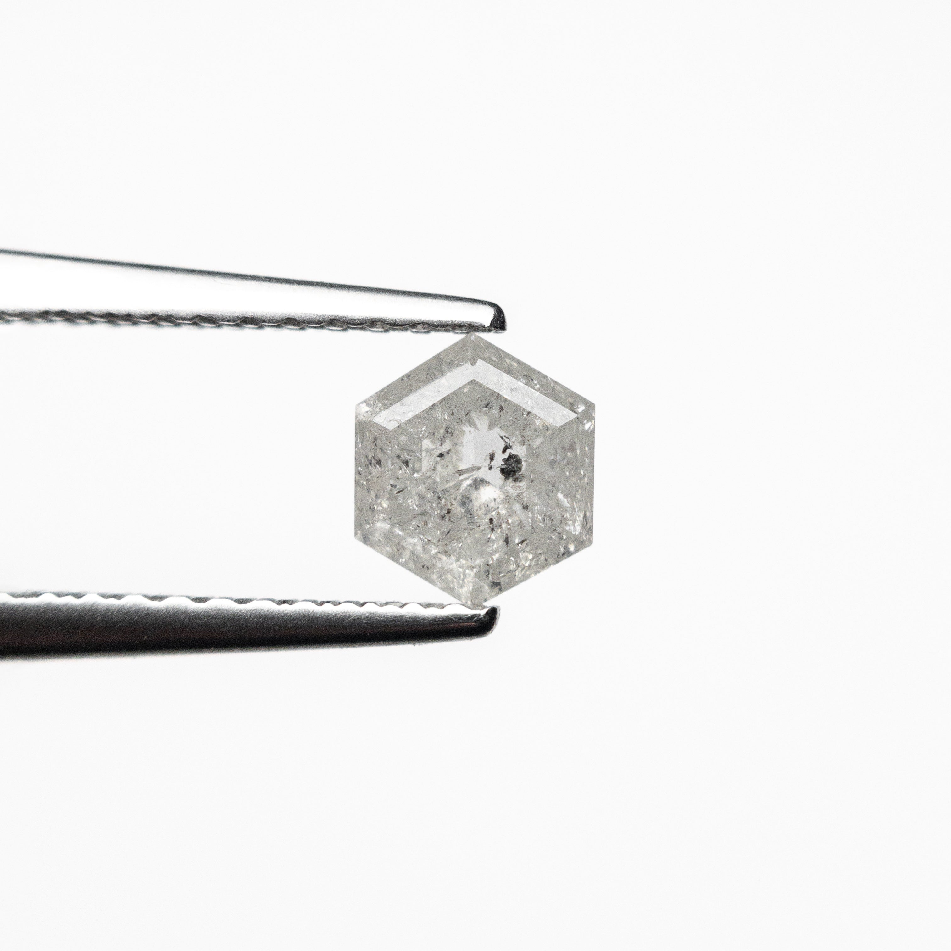 The 0.72ct 5.59x4.86x3.17mm Hexagon Step Cut 25457-15 by East London jeweller Rachel Boston | Discover our collections of unique and timeless engagement rings, wedding rings, and modern fine jewellery.