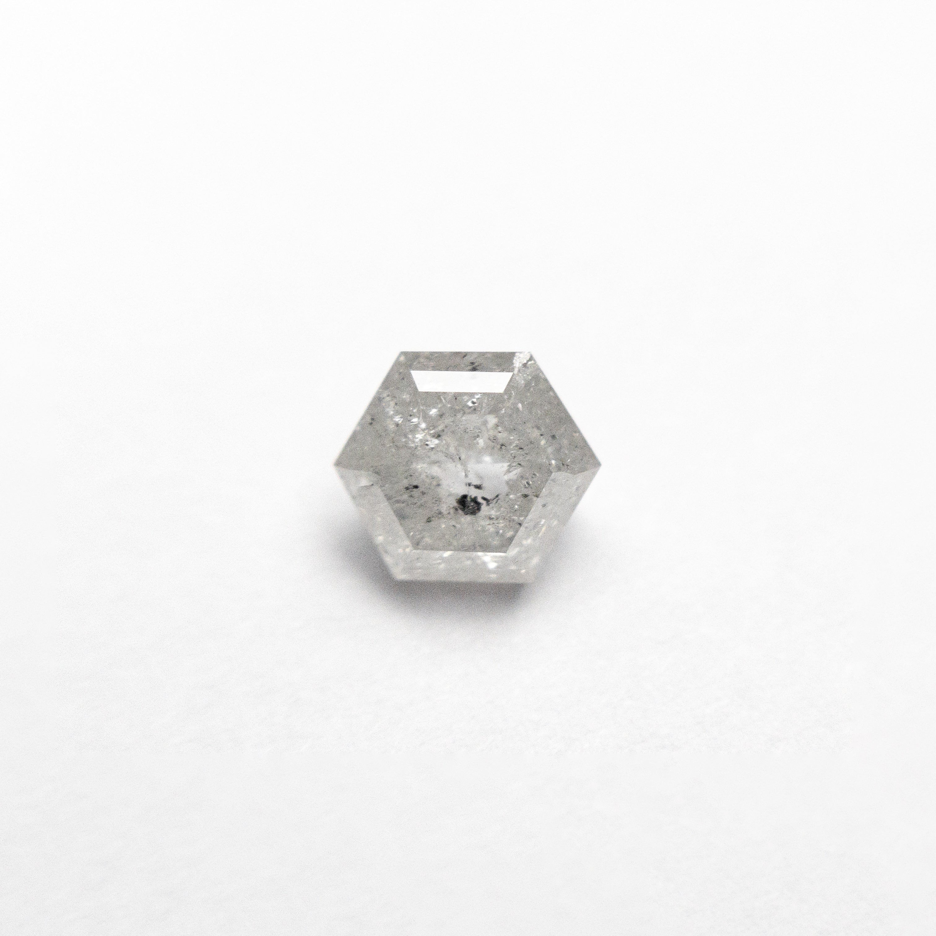 The 0.72ct 5.59x4.86x3.17mm Hexagon Step Cut 25457-15 by East London jeweller Rachel Boston | Discover our collections of unique and timeless engagement rings, wedding rings, and modern fine jewellery.