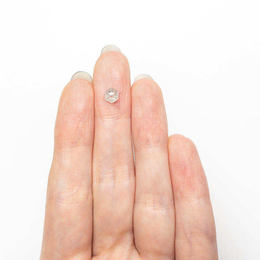 The 0.72ct 5.59x4.86x3.17mm Hexagon Step Cut 25457-15 by East London jeweller Rachel Boston | Discover our collections of unique and timeless engagement rings, wedding rings, and modern fine jewellery. - Rachel Boston Jewellery