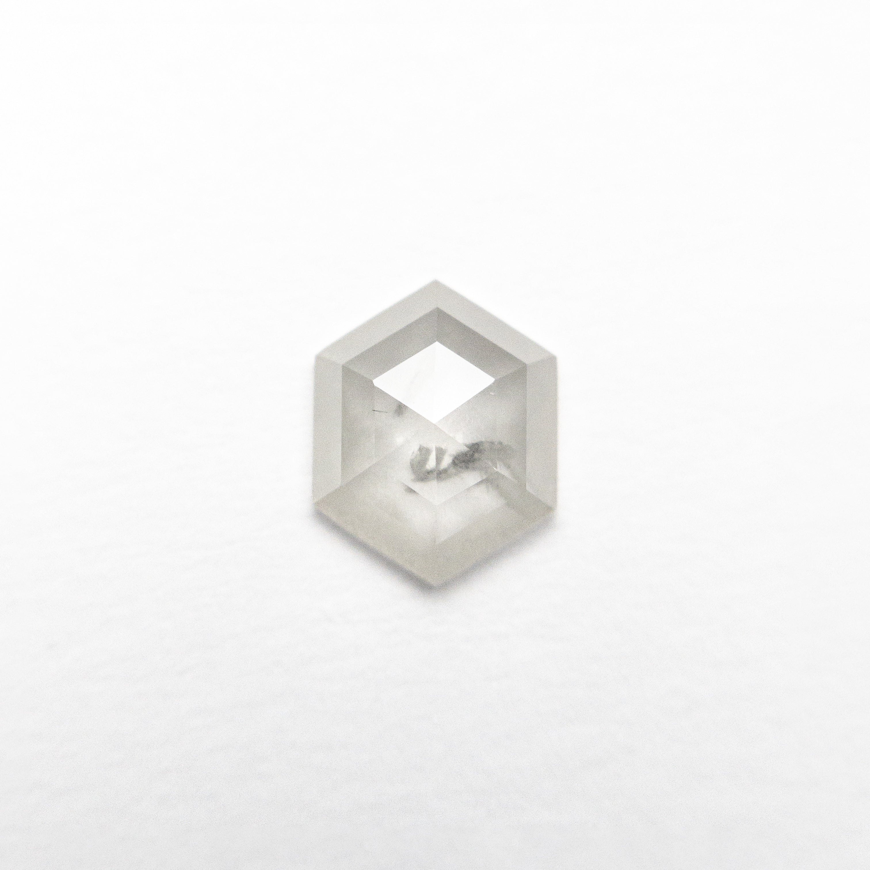 The 0.66ct 6.84x5.46x2.11mm Hexagon Rosecut 25457-16 by East London jeweller Rachel Boston | Discover our collections of unique and timeless engagement rings, wedding rings, and modern fine jewellery.