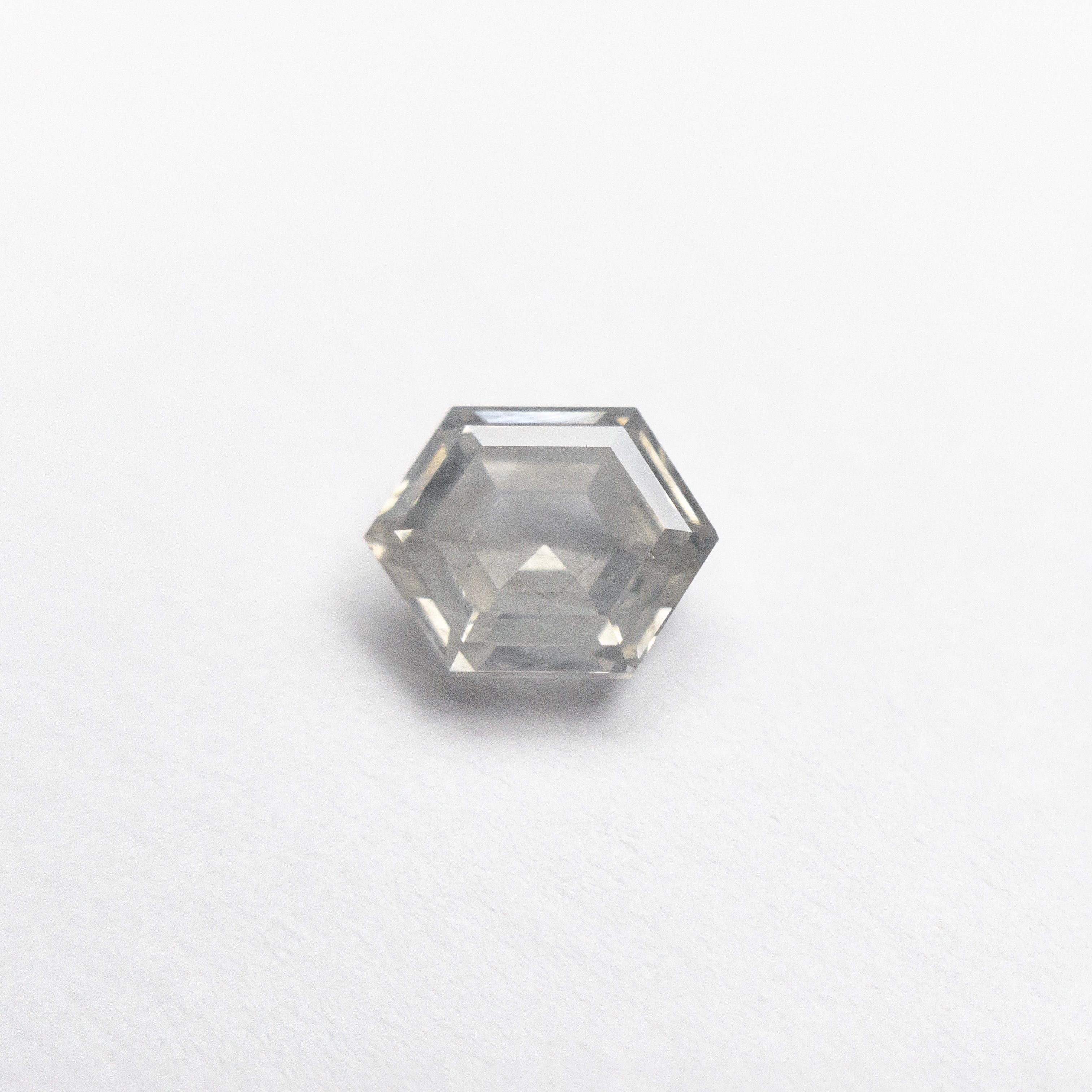 The 0.71ct 6.20x4.76x2.77mm Hexagon Step Cut 25457-18 by East London jeweller Rachel Boston | Discover our collections of unique and timeless engagement rings, wedding rings, and modern fine jewellery.