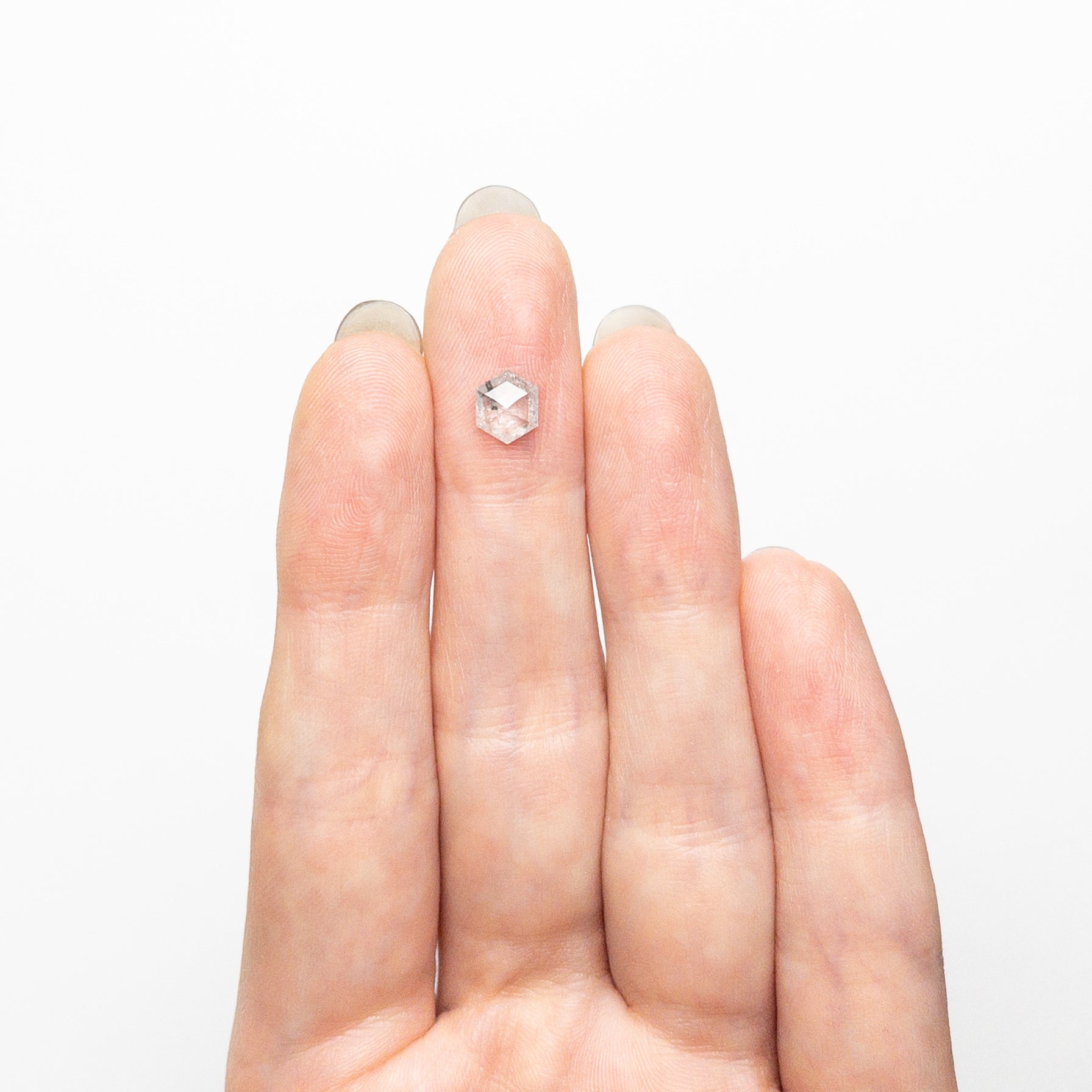The 0.65ct 6.55x5.41x2.28mm Hexagon Rosecut 25457-22 by East London jeweller Rachel Boston | Discover our collections of unique and timeless engagement rings, wedding rings, and modern fine jewellery.