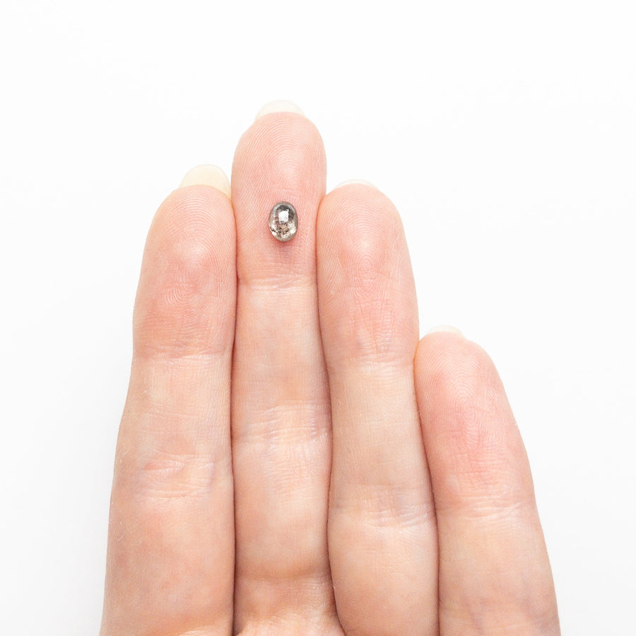 The 0.57ct 5.44x4.00x2.67mm Oval Cabochon Cut 25461-01 by East London jeweller Rachel Boston | Discover our collections of unique and timeless engagement rings, wedding rings, and modern fine jewellery. - Rachel Boston Jewellery