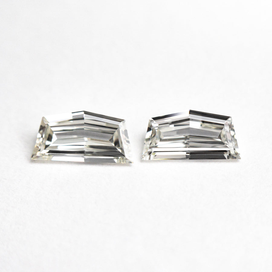 The 0.63cttw 2pc 6.75x3.40x1.50mm 6.62x3.33x1.57mm VVS H-I Epaulette Step Cut Matching Pair 25519-01 by East London jeweller Rachel Boston | Discover our collections of unique and timeless engagement rings, wedding rings, and modern fine jewellery. - Rachel Boston Jewellery