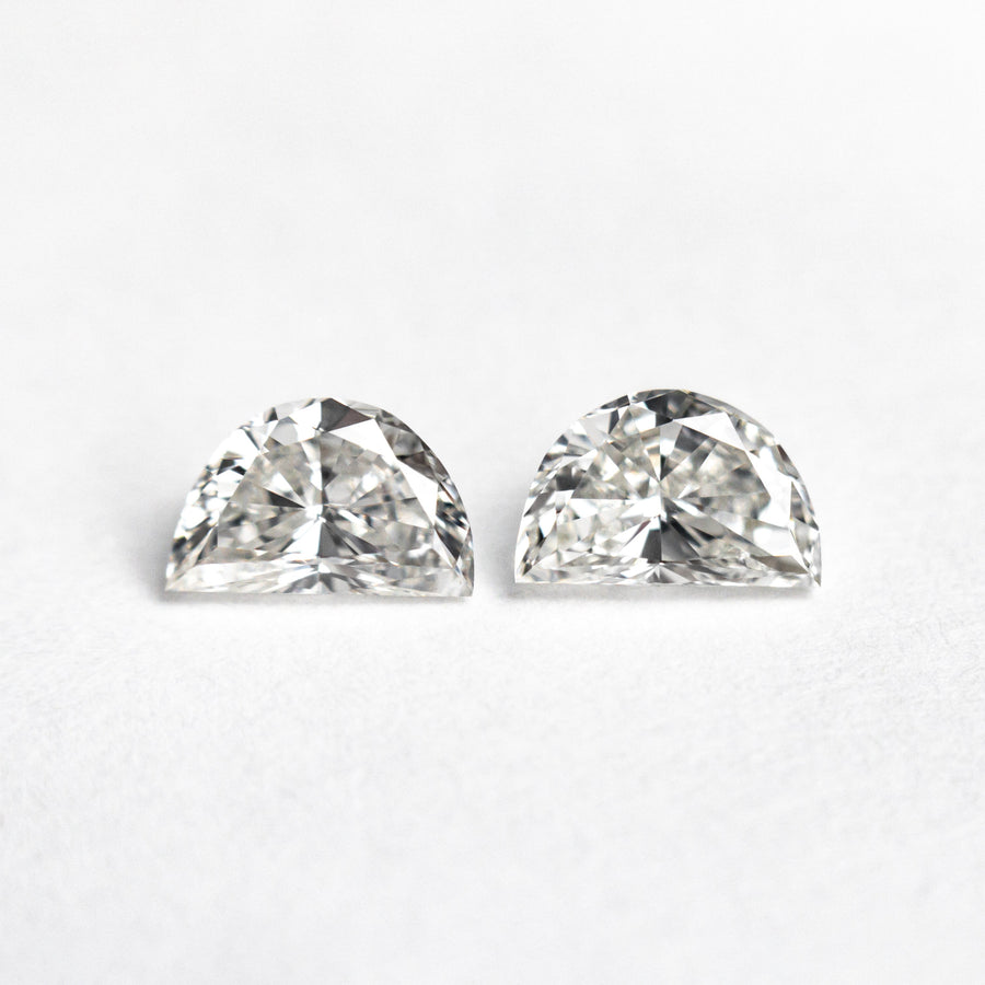 The 0.76cttw 2pc 5.64x3.59x2.54mm 5.67x3.62x2.45mm VS E-F Half Moon Brilliant Matching Pair 25520-01 by East London jeweller Rachel Boston | Discover our collections of unique and timeless engagement rings, wedding rings, and modern fine jewellery. - Rachel Boston Jewellery