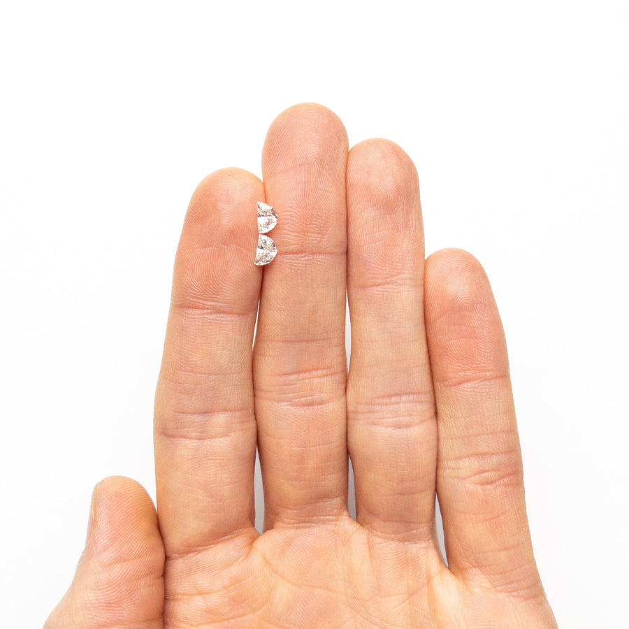 The 0.76cttw 2pc 5.64x3.59x2.54mm 5.67x3.62x2.45mm VS E-F Half Moon Brilliant Matching Pair 25520-01 by East London jeweller Rachel Boston | Discover our collections of unique and timeless engagement rings, wedding rings, and modern fine jewellery. - Rachel Boston Jewellery