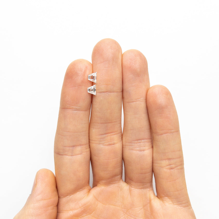 The 0.81cttw 2pc 5.74x4.38x2.09mm 5.65x4.33x2.28mm VS2/SI1 F-G Trapezoid Step Cut Matching Pair 25522-01 by East London jeweller Rachel Boston | Discover our collections of unique and timeless engagement rings, wedding rings, and modern fine jewellery. - Rachel Boston Jewellery