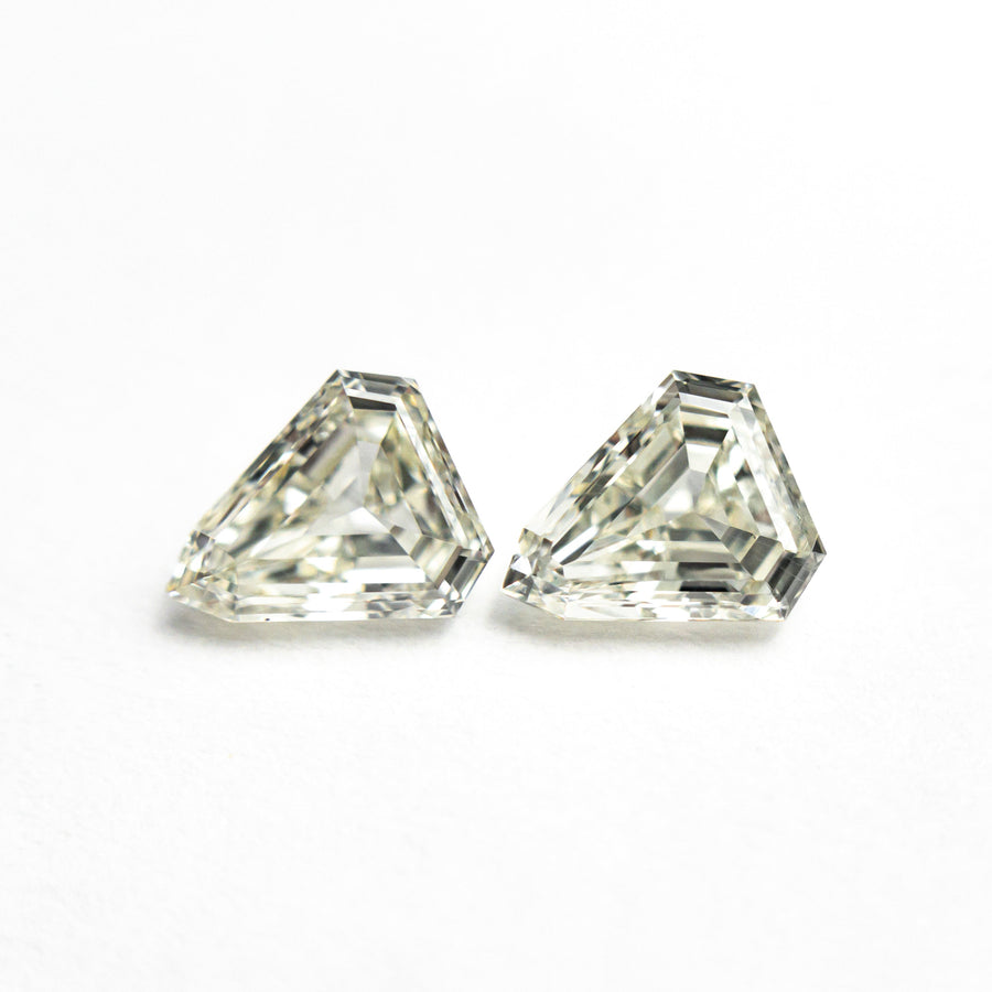 The 1.01cttw 2pc 5.81x5.00x2.50mm 5.77x5.02x2.56mm VS M-N Shield Step Cut Matching Pair 25529-01 by East London jeweller Rachel Boston | Discover our collections of unique and timeless engagement rings, wedding rings, and modern fine jewellery. - Rachel Boston Jewellery