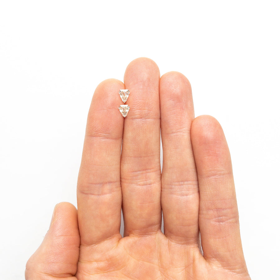 The 1.01cttw 2pc 5.81x5.00x2.50mm 5.77x5.02x2.56mm VS M-N Shield Step Cut Matching Pair 25529-01 by East London jeweller Rachel Boston | Discover our collections of unique and timeless engagement rings, wedding rings, and modern fine jewellery. - Rachel Boston Jewellery