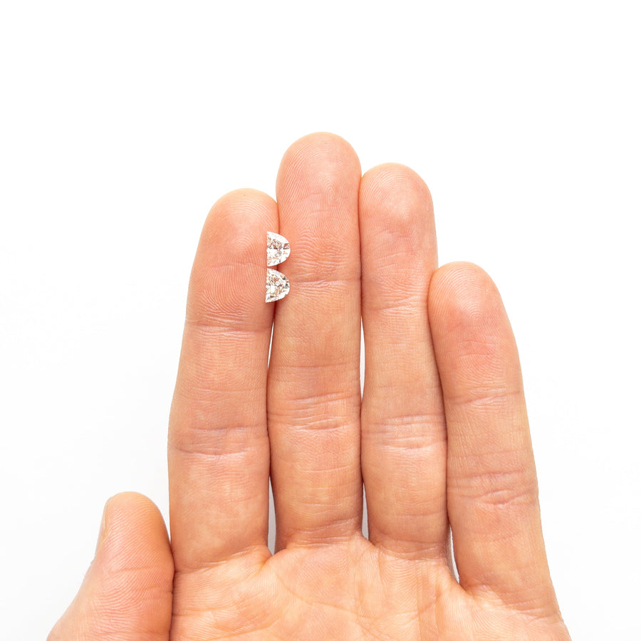 The 1.04cttw 2pc 6.42x4.35x2.86mm 6.45x4.39x2.64mm VVS I-J Half Moon Brilliant Matching Pair 25534-01 by East London jeweller Rachel Boston | Discover our collections of unique and timeless engagement rings, wedding rings, and modern fine jewellery. - Rachel Boston Jewellery