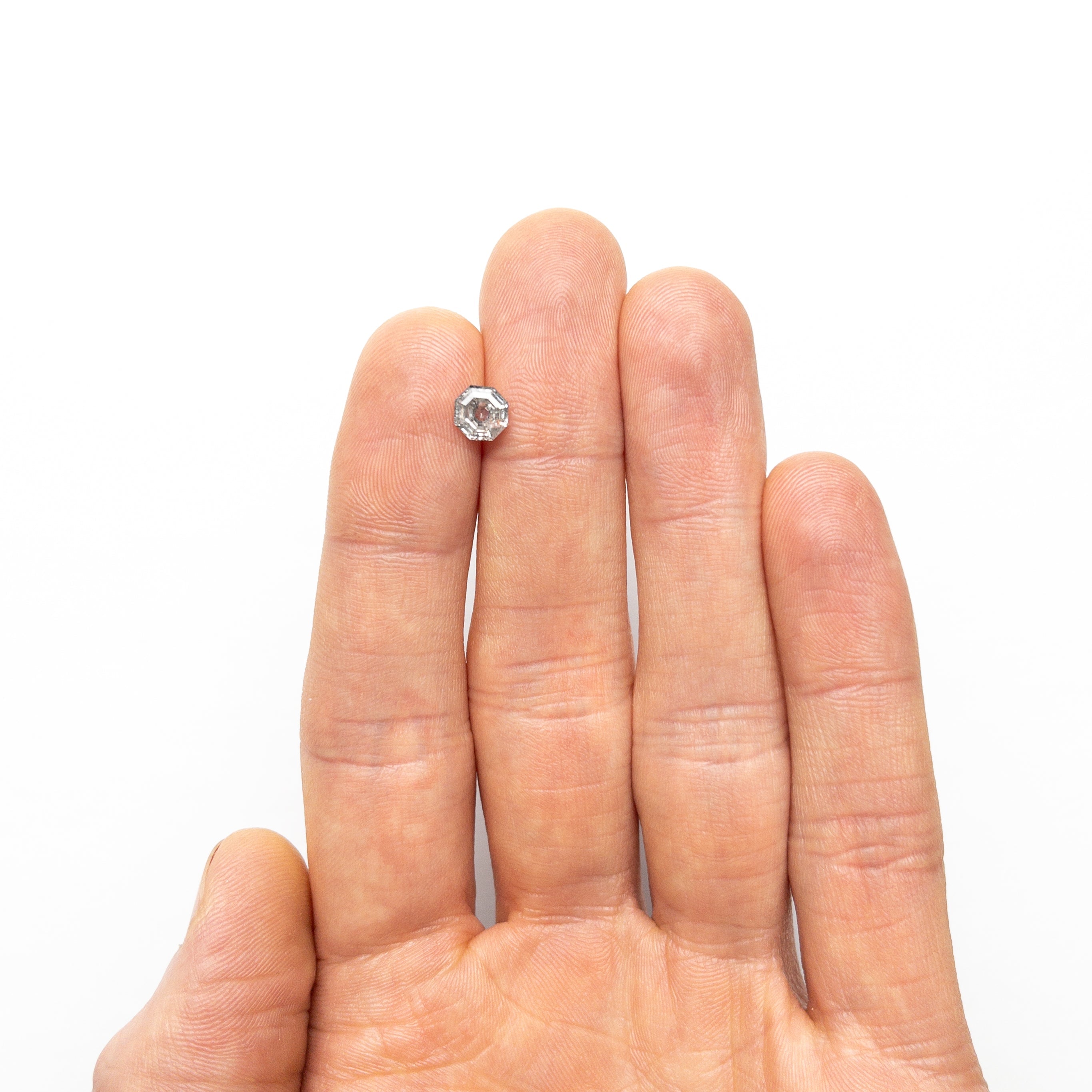 The 0.92ct 5.98x5.86x3.26mm Octagon Step Cut 🇨🇦 25619-01 by East London jeweller Rachel Boston | Discover our collections of unique and timeless engagement rings, wedding rings, and modern fine jewellery.