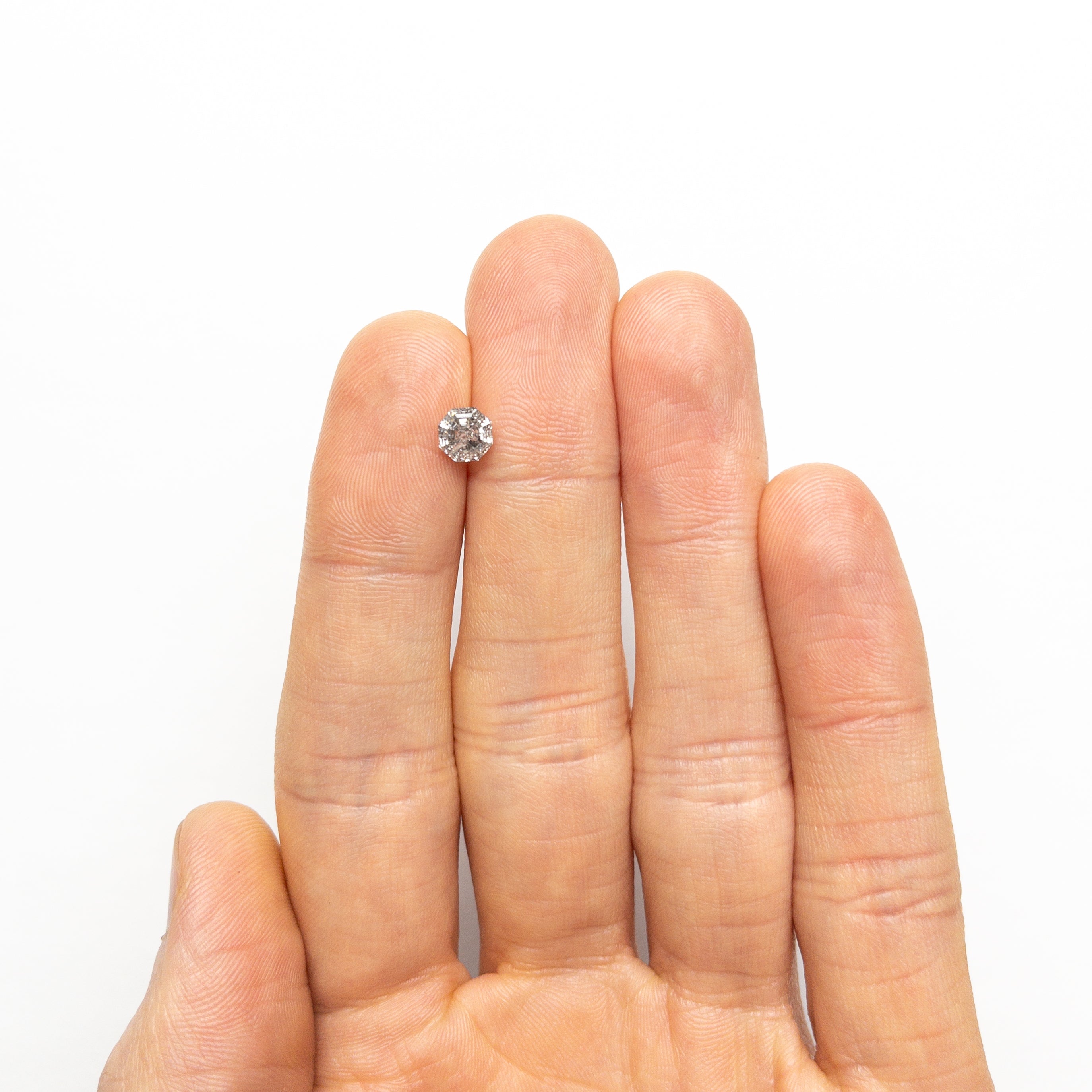 The 1.01ct 5.48x5.43x4.09mm Octagon Step Cut 🇨🇦 25624-01 by East London jeweller Rachel Boston | Discover our collections of unique and timeless engagement rings, wedding rings, and modern fine jewellery.