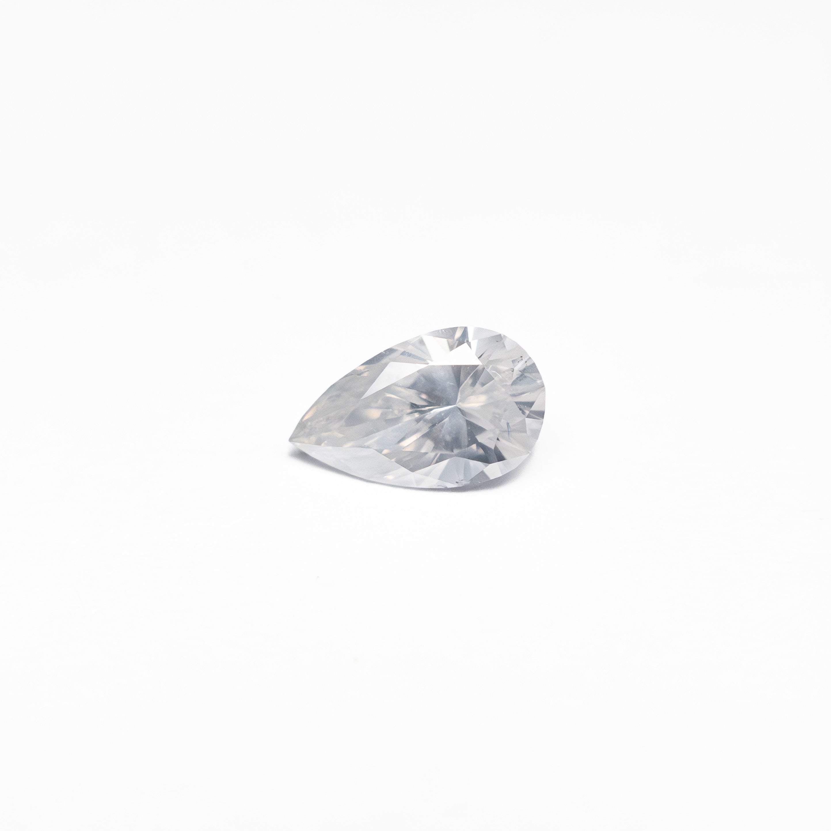 The 0.25ct 5.75x3.43x2.26mm Pear Brilliant 25694-03 by East London jeweller Rachel Boston | Discover our collections of unique and timeless engagement rings, wedding rings, and modern fine jewellery.