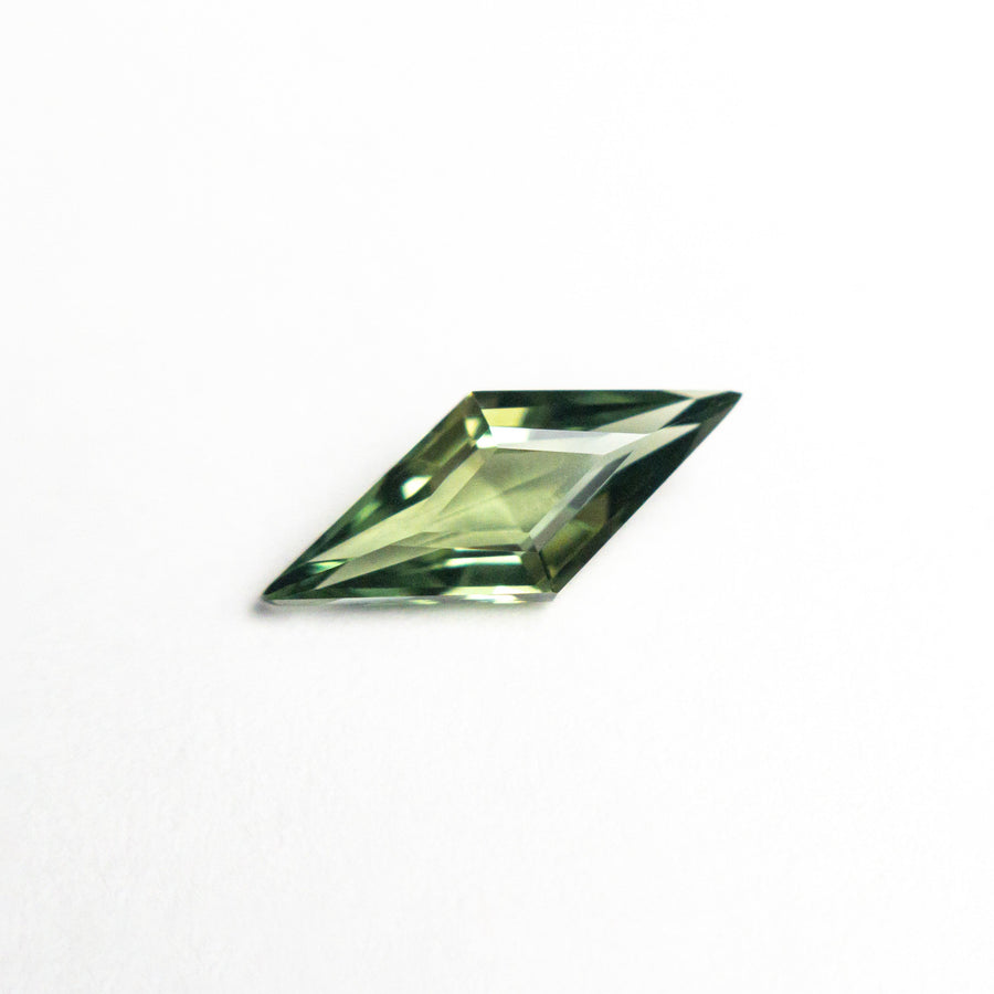 The 0.66ct 10.18x4.32x2.50mm Lozenge Step Cut Sapphire 25740-08 by East London jeweller Rachel Boston | Discover our collections of unique and timeless engagement rings, wedding rings, and modern fine jewellery. - Rachel Boston Jewellery