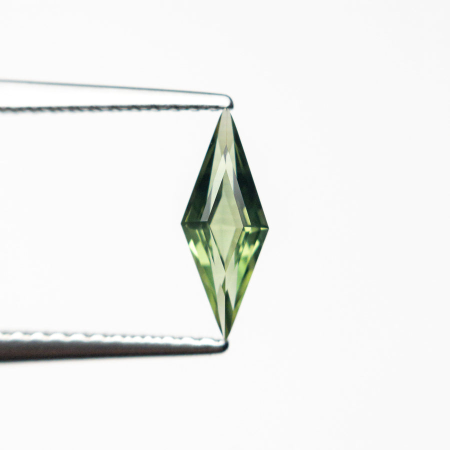The 0.51ct 9.97x3.79x2.39mm Lozenge Step Cut Sapphire 25740-11 by East London jeweller Rachel Boston | Discover our collections of unique and timeless engagement rings, wedding rings, and modern fine jewellery. - Rachel Boston Jewellery