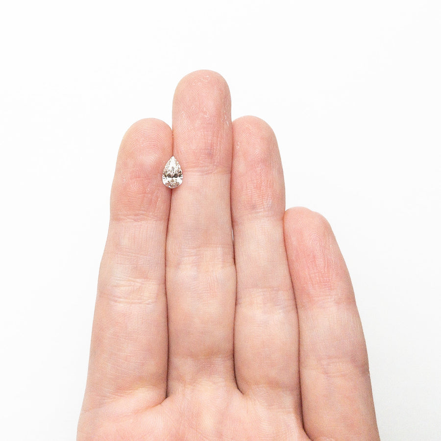 The 0.50ct 7.14x4.45x2.66mm Pear Brilliant 25794-02 by East London jeweller Rachel Boston | Discover our collections of unique and timeless engagement rings, wedding rings, and modern fine jewellery. - Rachel Boston Jewellery