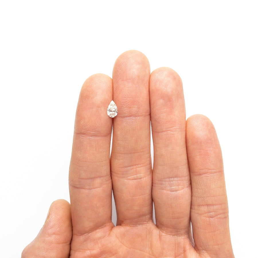 The 0.50ct 7.53x4.51x2.46mm VS1 L Pear Brilliant 25794-03 by East London jeweller Rachel Boston | Discover our collections of unique and timeless engagement rings, wedding rings, and modern fine jewellery. - Rachel Boston Jewellery