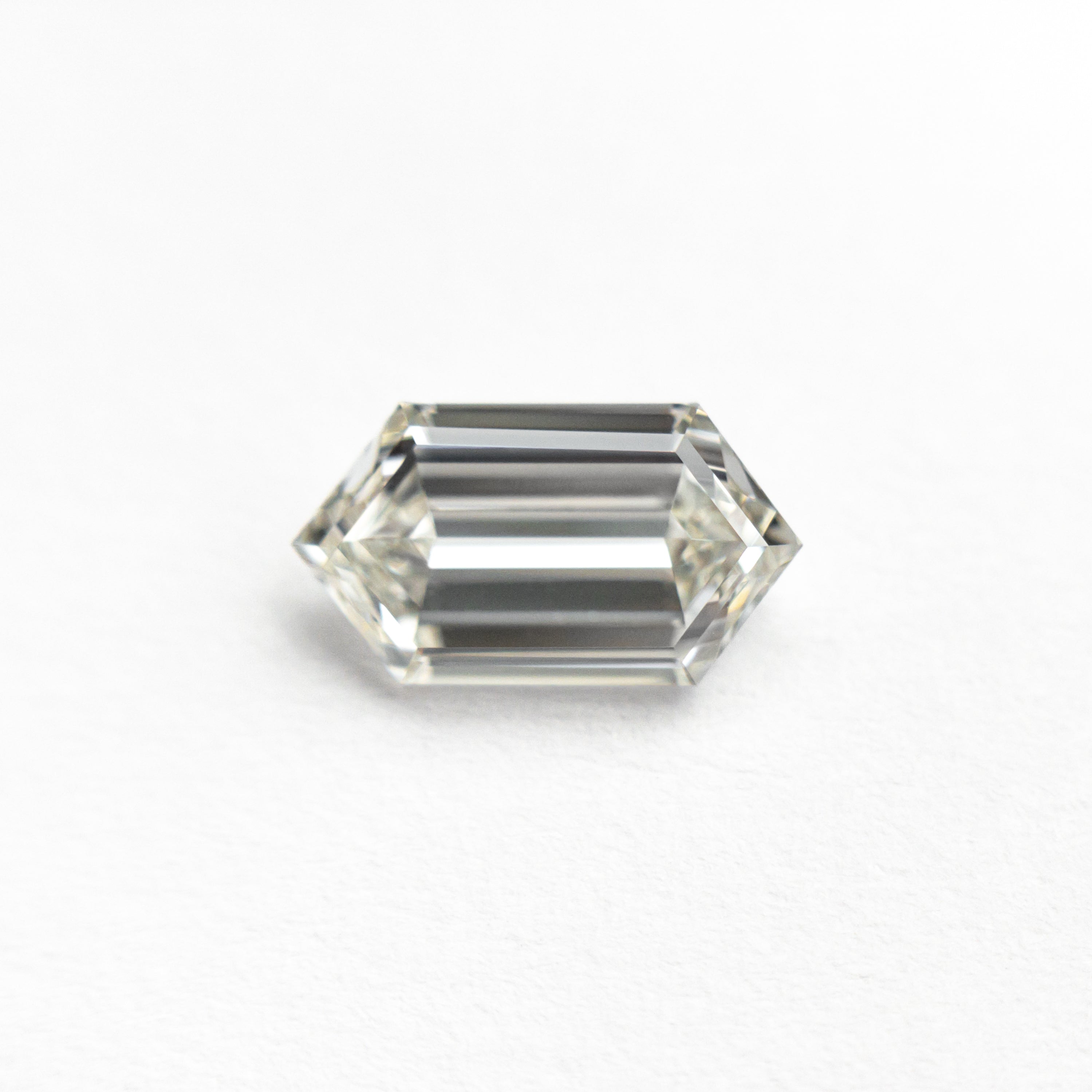 The 1.00ct 8.65x4.79x2.77mm GIA VS1 I Hexagon Step Cut 25803-08 by East London jeweller Rachel Boston | Discover our collections of unique and timeless engagement rings, wedding rings, and modern fine jewellery.