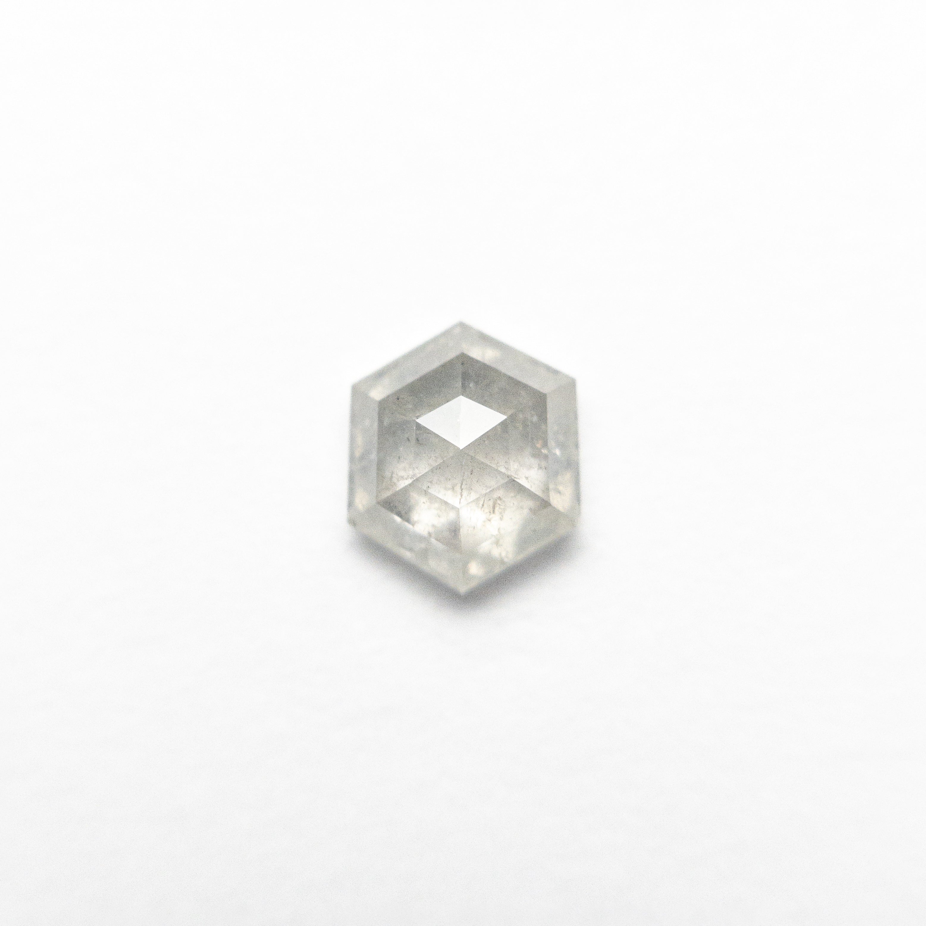 The 0.73ct 6.03x5.17x2.87mm Hexagon Step Cut 25807-33 by East London jeweller Rachel Boston | Discover our collections of unique and timeless engagement rings, wedding rings, and modern fine jewellery.