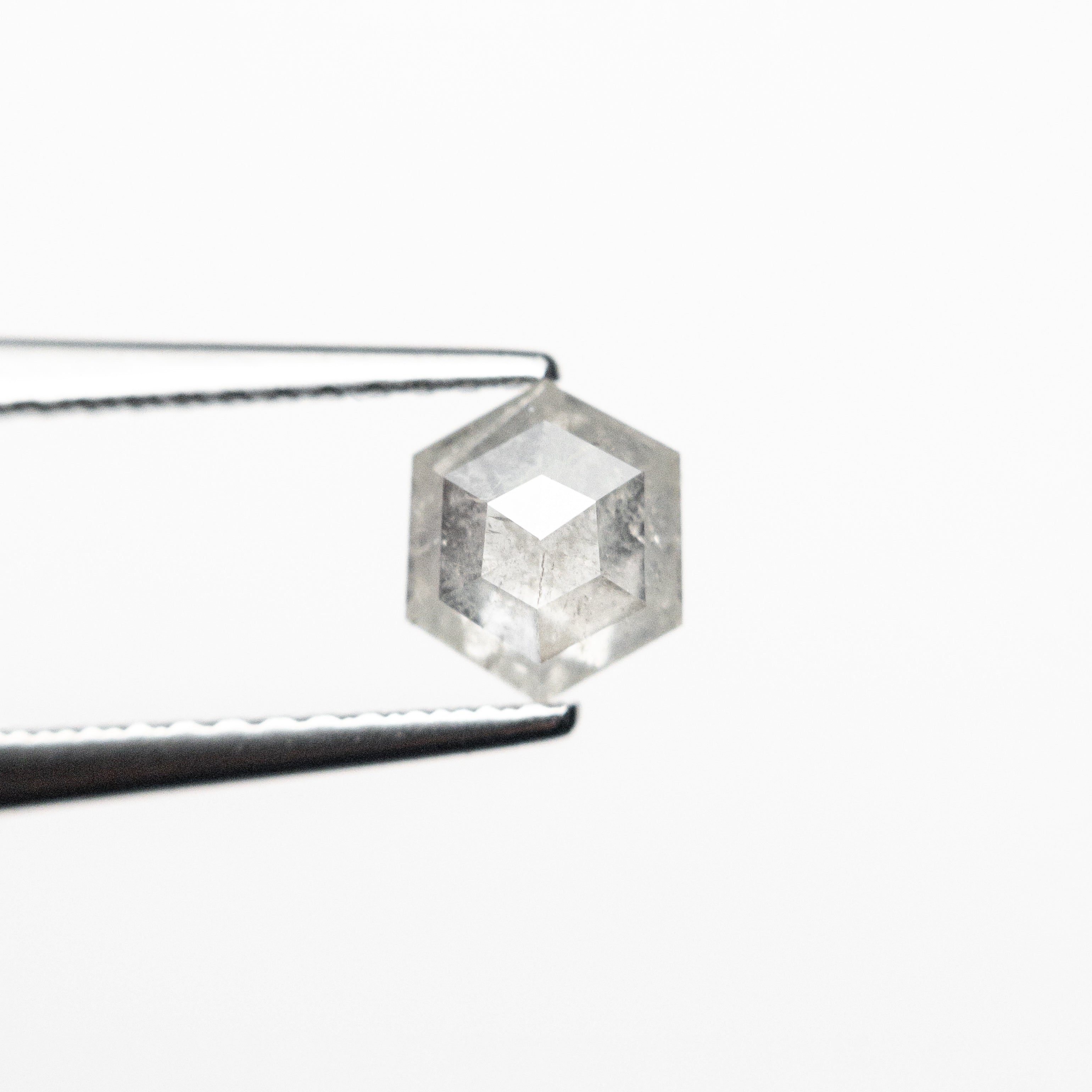 The 0.73ct 6.03x5.17x2.87mm Hexagon Step Cut 25807-33 by East London jeweller Rachel Boston | Discover our collections of unique and timeless engagement rings, wedding rings, and modern fine jewellery.