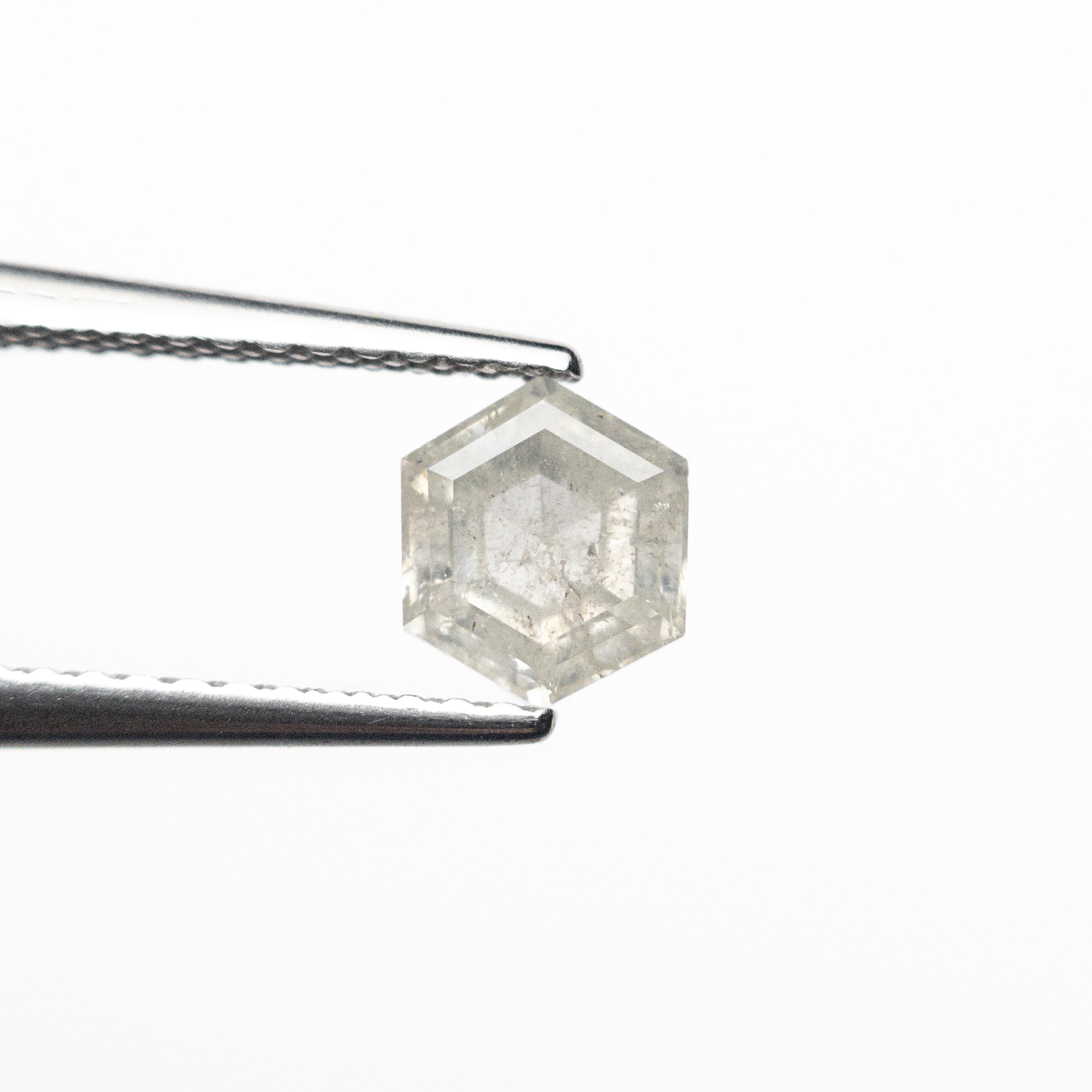 The 0.73ct 6.03x5.17x2.87mm Hexagon Step Cut 25807-33 by East London jeweller Rachel Boston | Discover our collections of unique and timeless engagement rings, wedding rings, and modern fine jewellery.