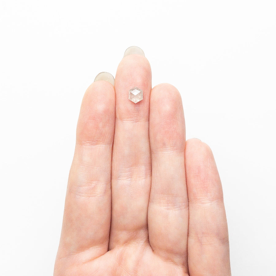 The 0.73ct 6.03x5.17x2.87mm Hexagon Step Cut by East London jeweller Rachel Boston | Discover our collections of unique and timeless engagement rings, wedding rings, and modern fine jewellery. - Rachel Boston Jewellery