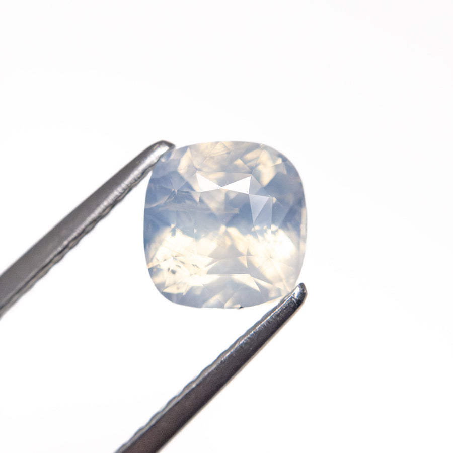The 1.51ct 6.27x6.10x4.55mm Cushion Brilliant Sapphire 25860-01 by East London jeweller Rachel Boston | Discover our collections of unique and timeless engagement rings, wedding rings, and modern fine jewellery. - Rachel Boston Jewellery