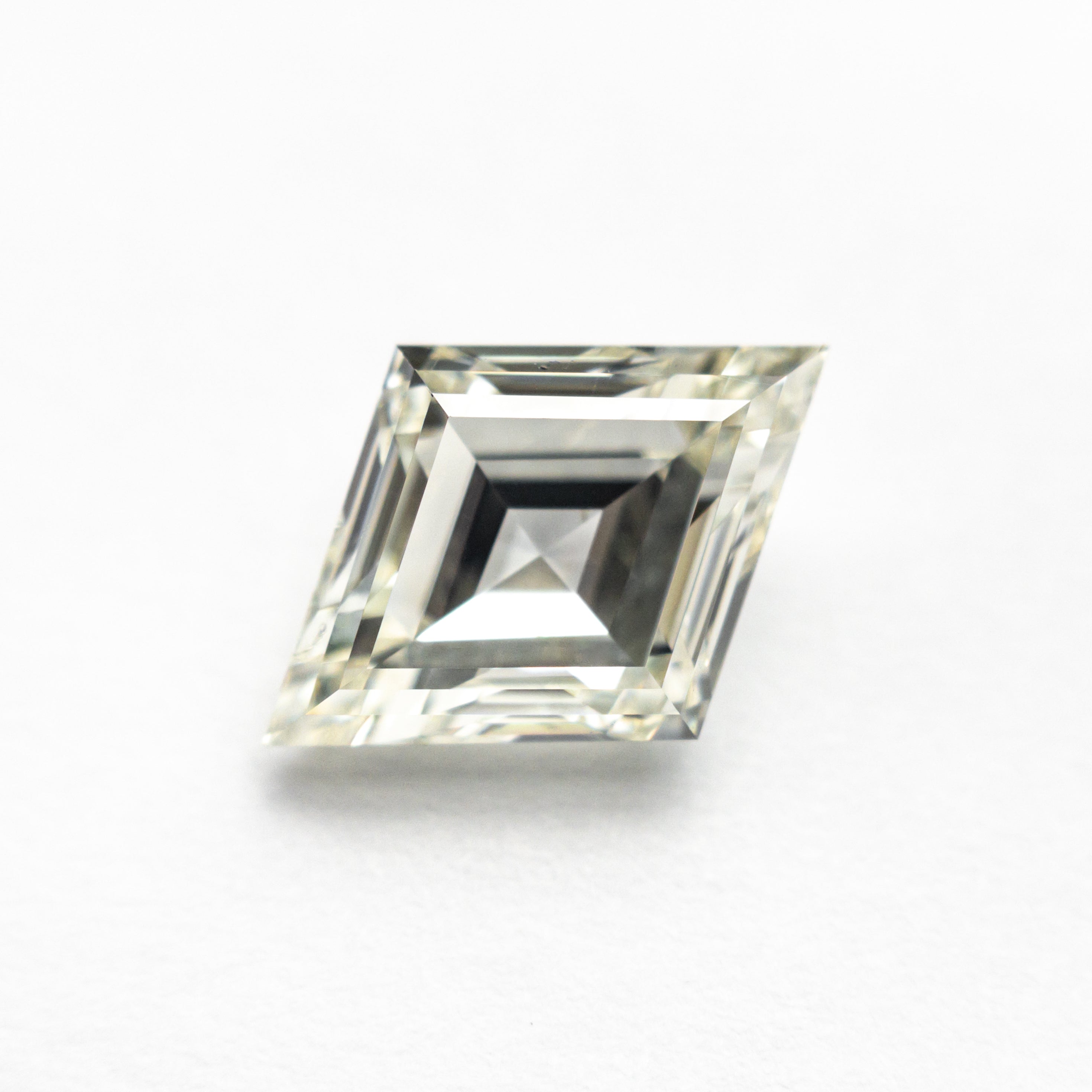 The 2.12ct 11.62x8.29x4.22mm GIA SI2 N Lozenge Step Cut 25913-01 by East London jeweller Rachel Boston | Discover our collections of unique and timeless engagement rings, wedding rings, and modern fine jewellery.