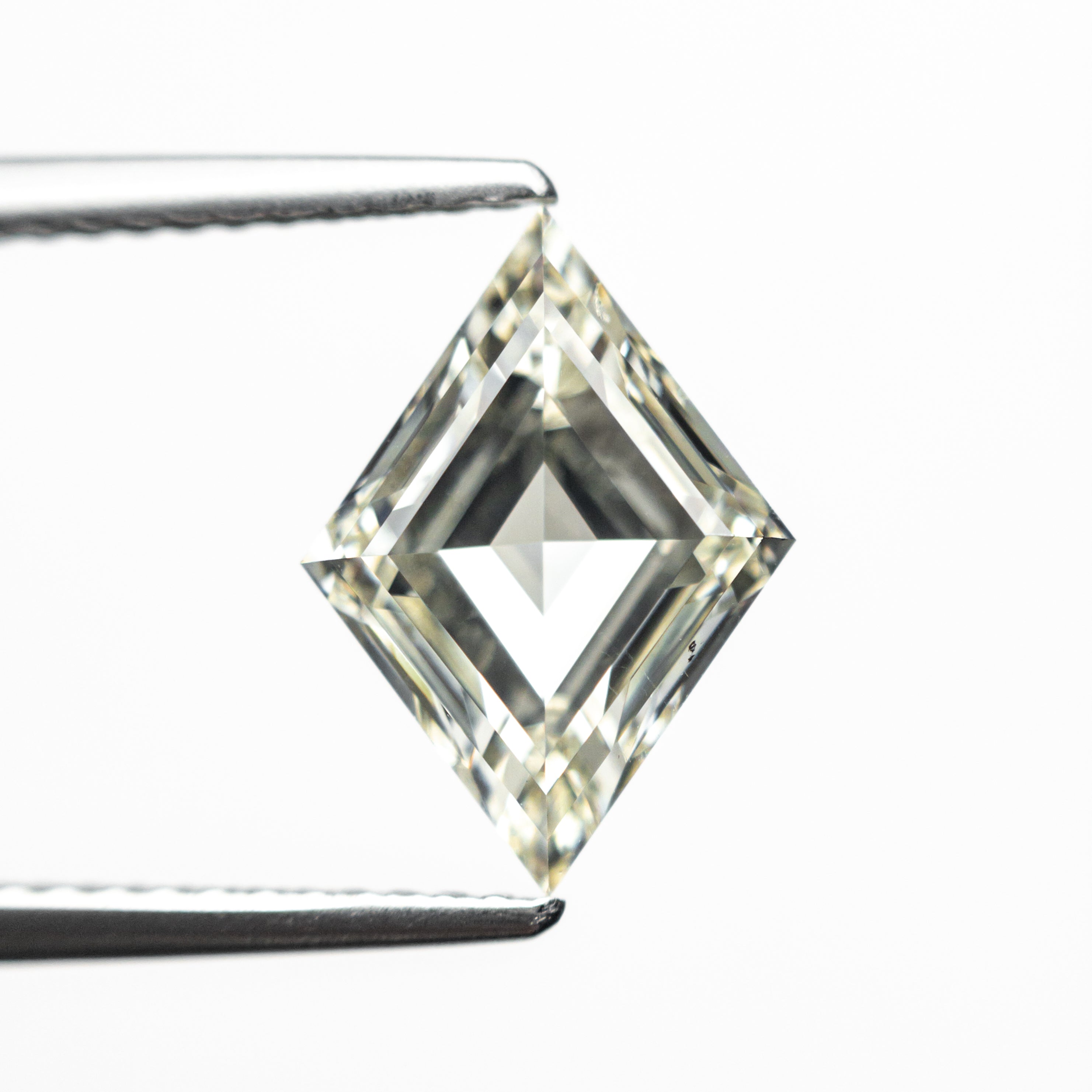 The 2.12ct 11.62x8.29x4.22mm GIA SI2 N Lozenge Step Cut 25913-01 by East London jeweller Rachel Boston | Discover our collections of unique and timeless engagement rings, wedding rings, and modern fine jewellery.