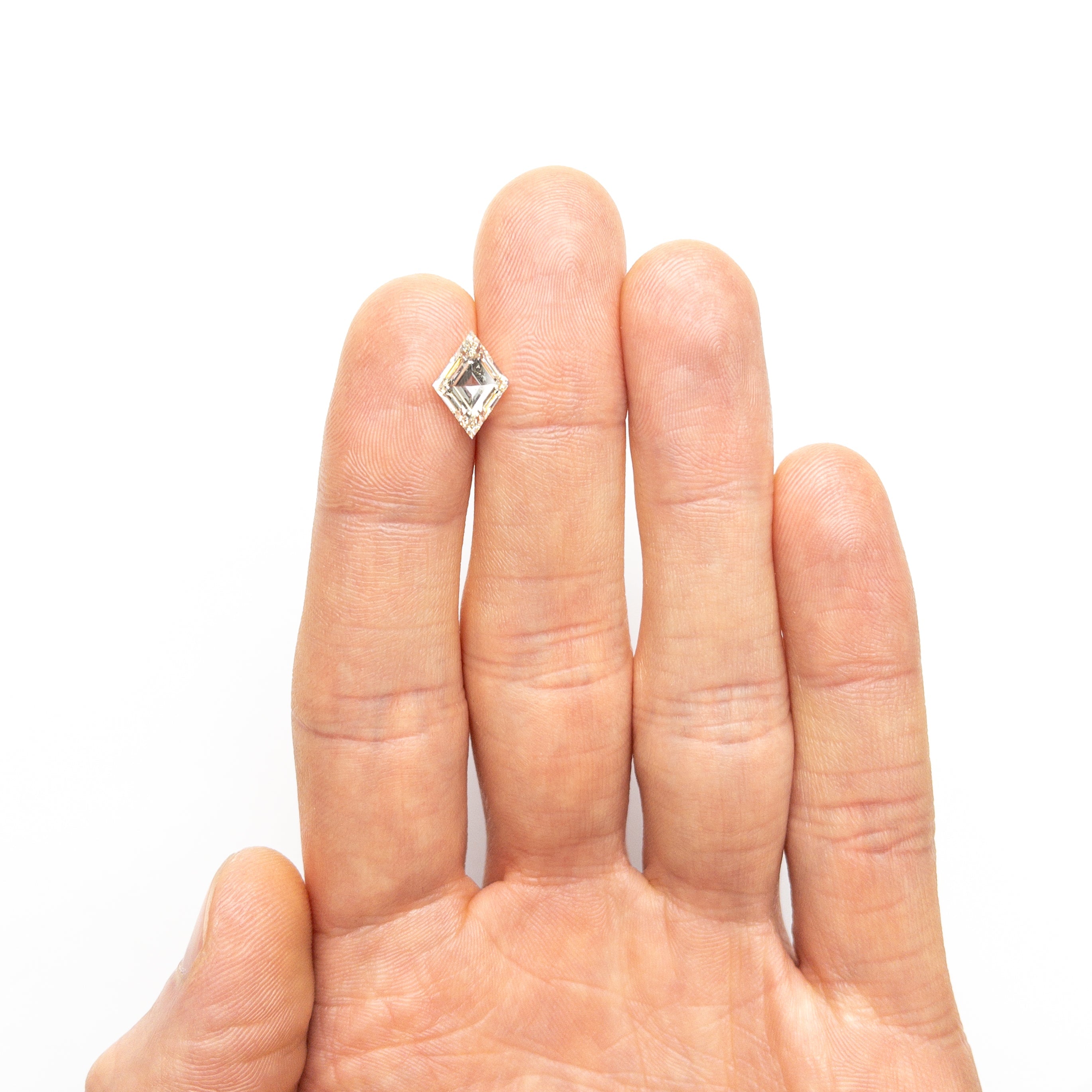 The 2.12ct 11.62x8.29x4.22mm GIA SI2 N Lozenge Step Cut 25913-01 by East London jeweller Rachel Boston | Discover our collections of unique and timeless engagement rings, wedding rings, and modern fine jewellery.