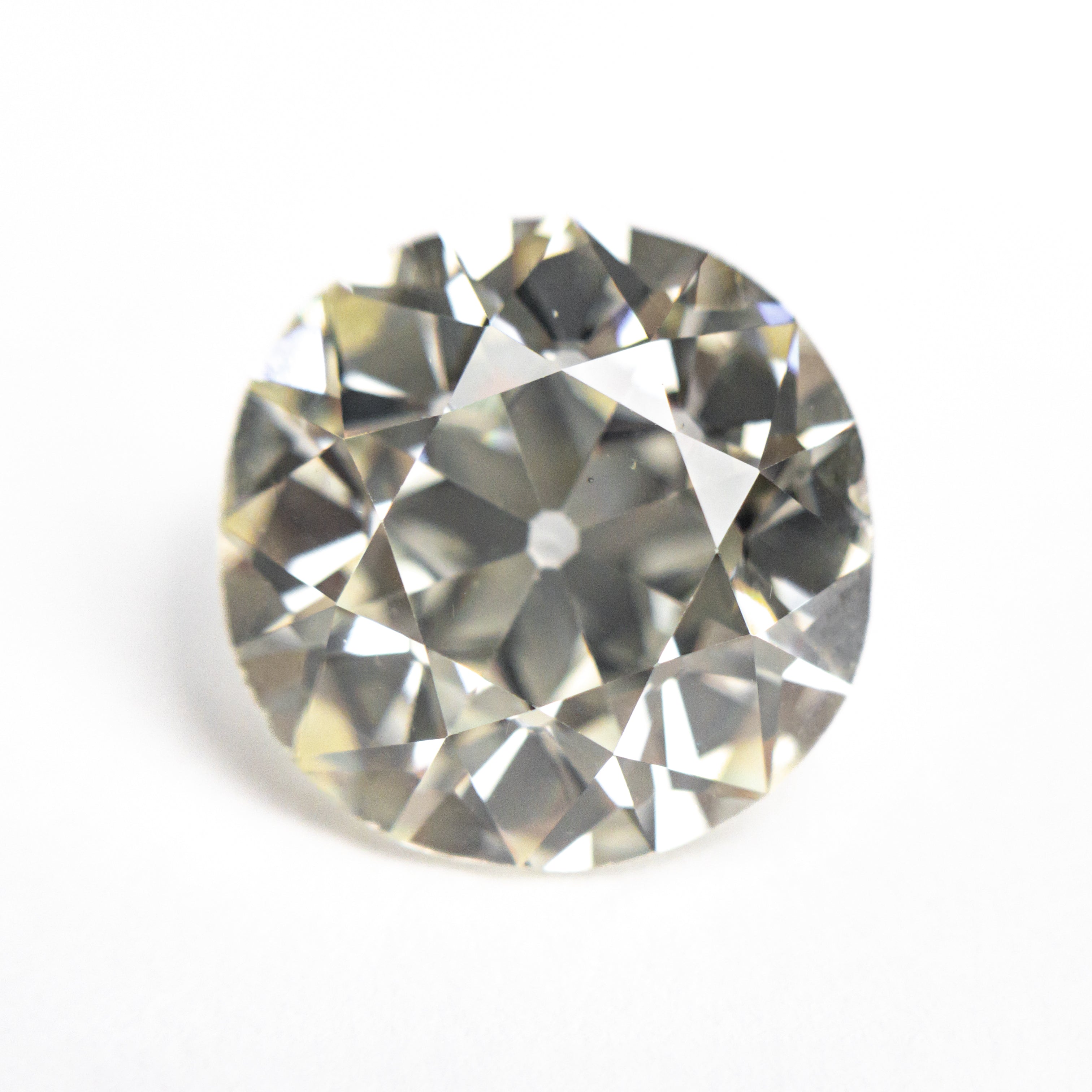 The 5.85ct 11.68x11.34x6.96mm GIA SI1 O-P Antique Old European Cut 25950-01 by East London jeweller Rachel Boston | Discover our collections of unique and timeless engagement rings, wedding rings, and modern fine jewellery.